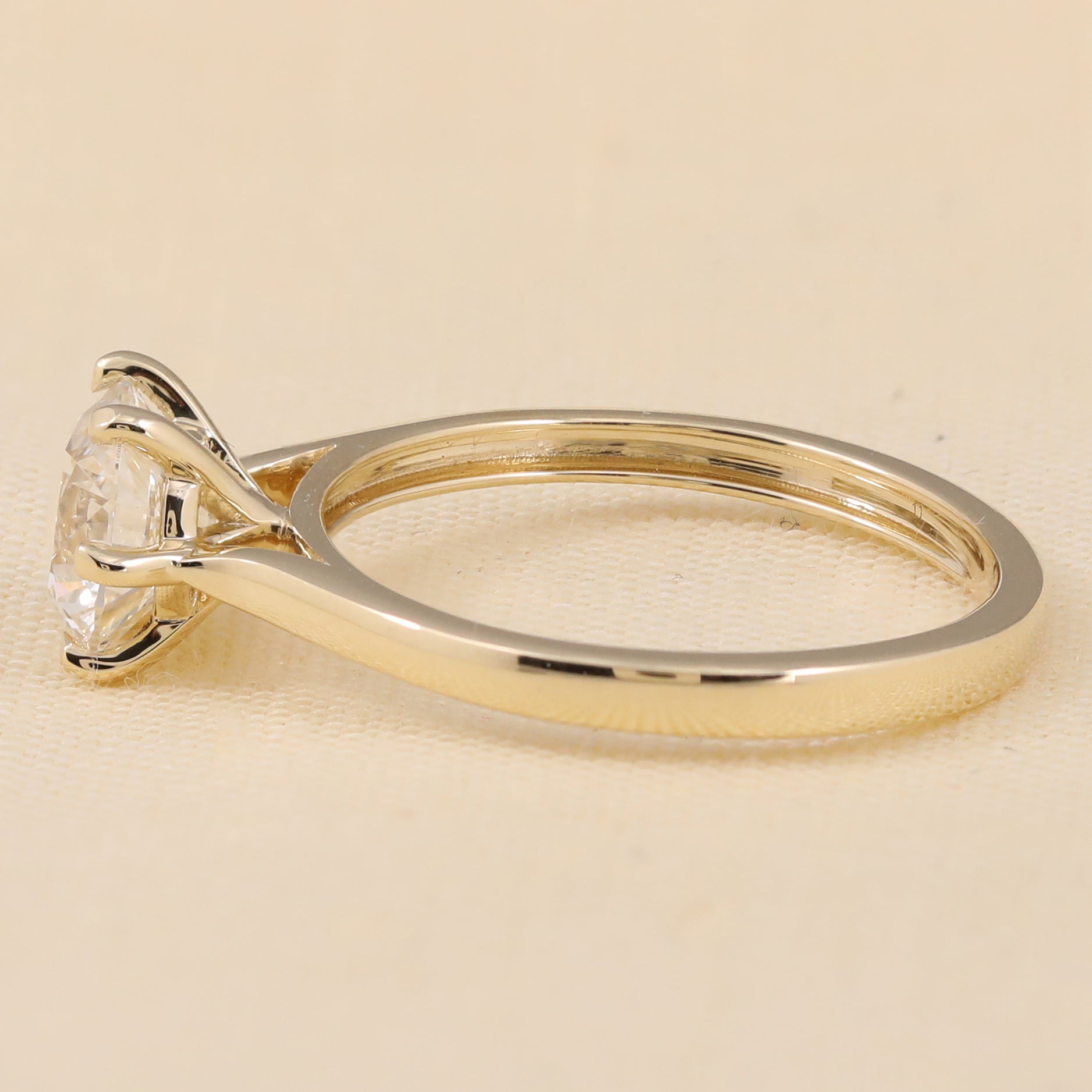 Timeless round lab diamond engagement ring with a six prong setting