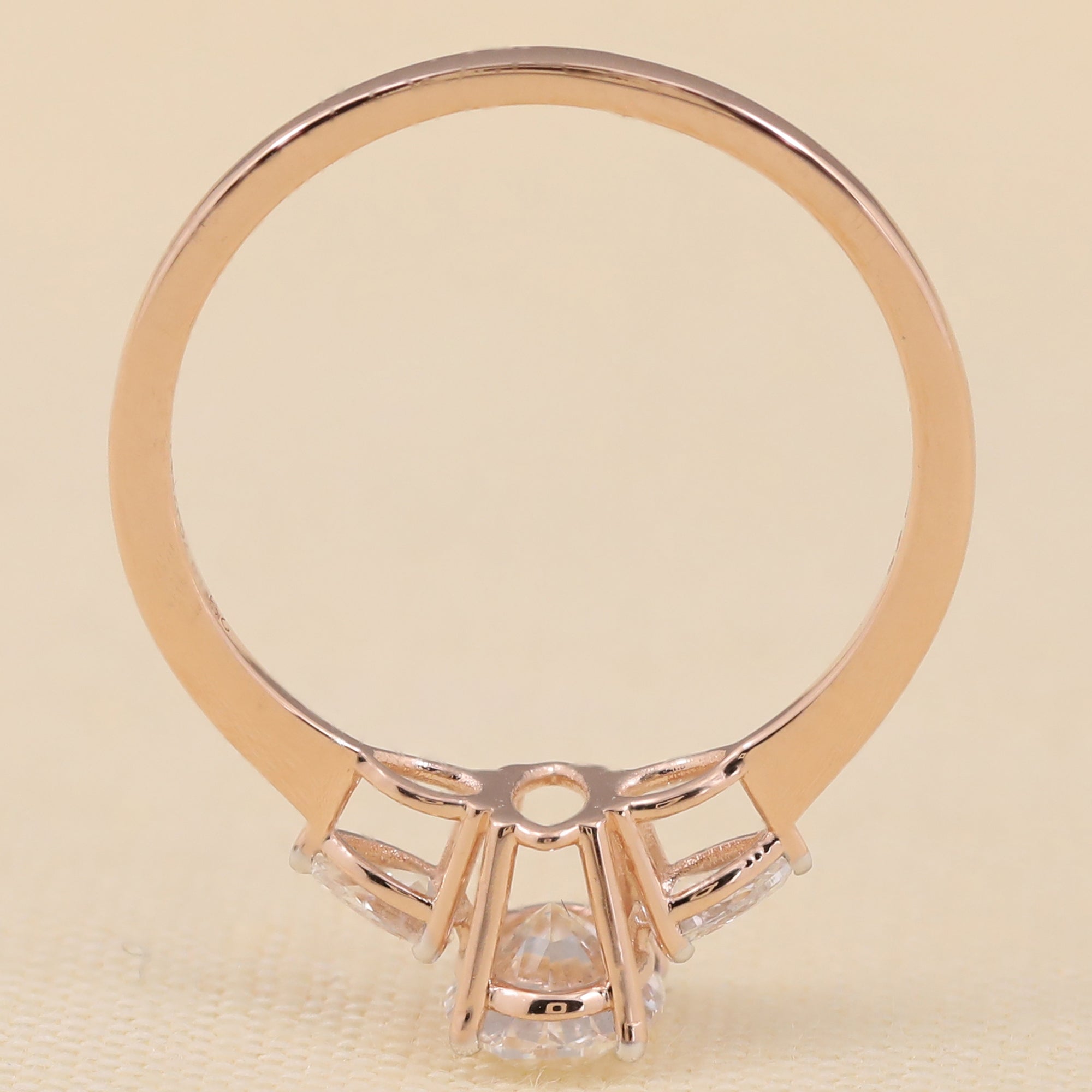 Modern oval lab diamond ring designed with pear lab diamond accents for added brilliance