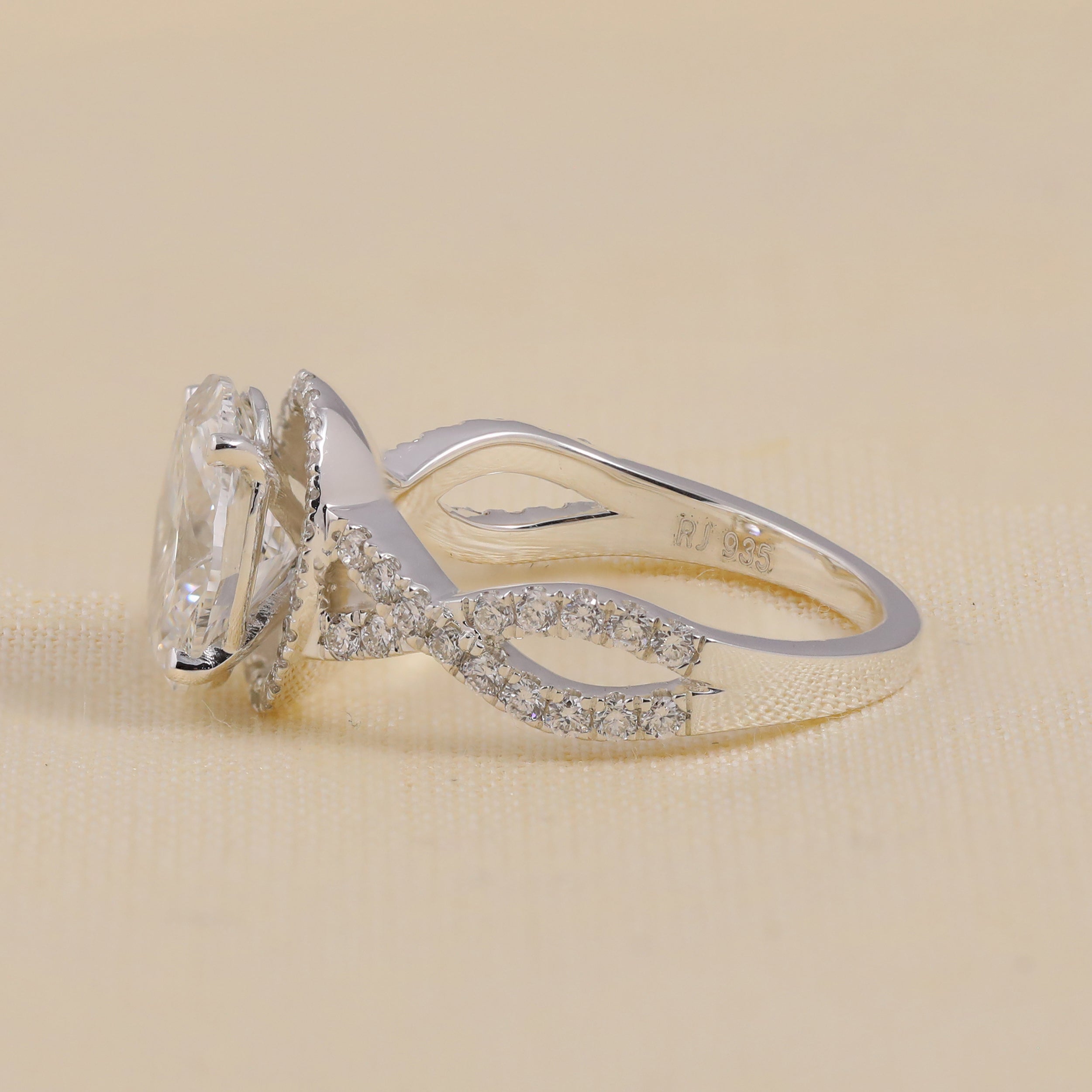 Oval Cut Lab Grown Diamond Halo Engagement Ring with Twisted Band