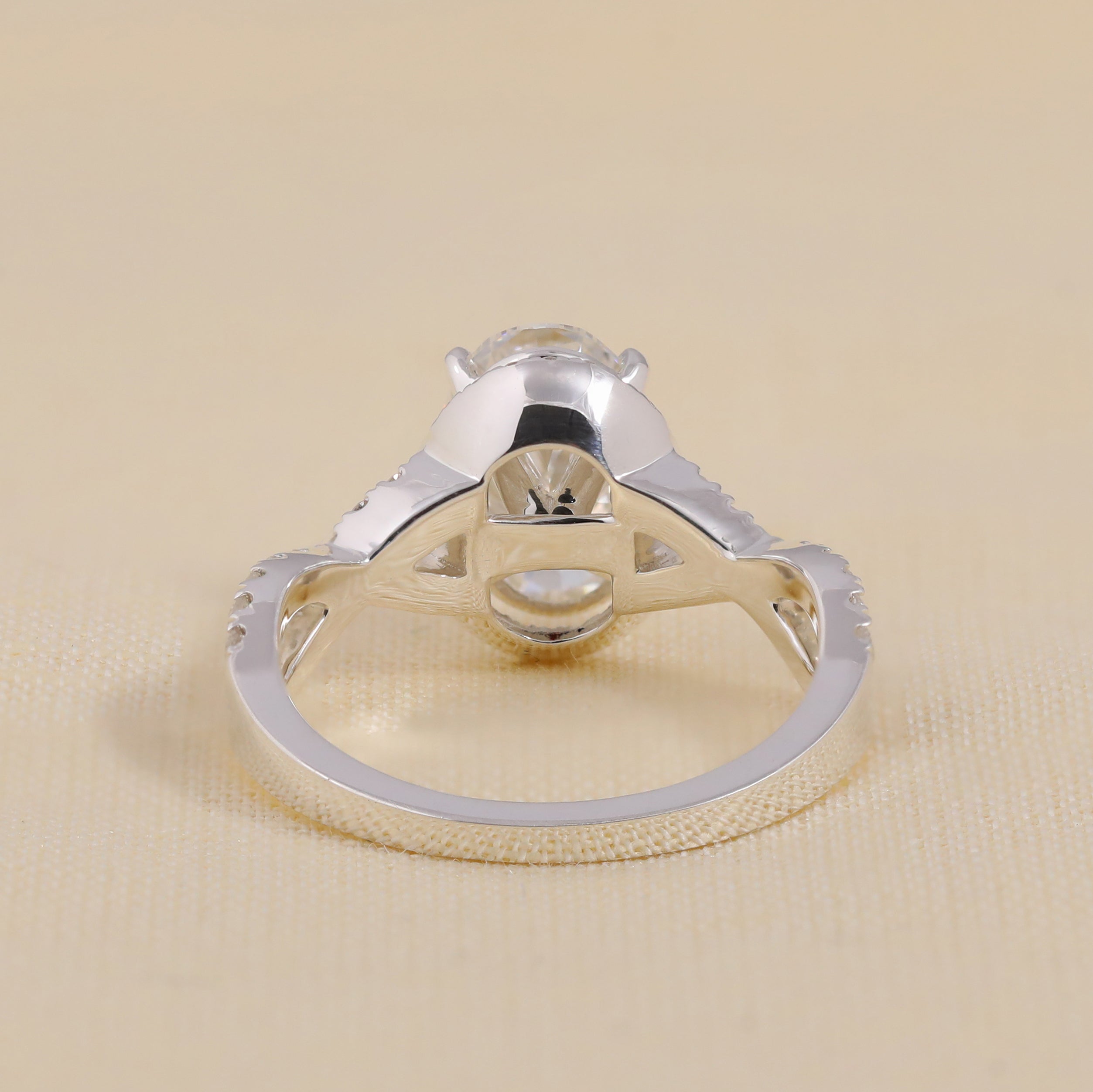 Oval Cut Lab Grown Diamond Halo Engagement Ring with Twisted Band