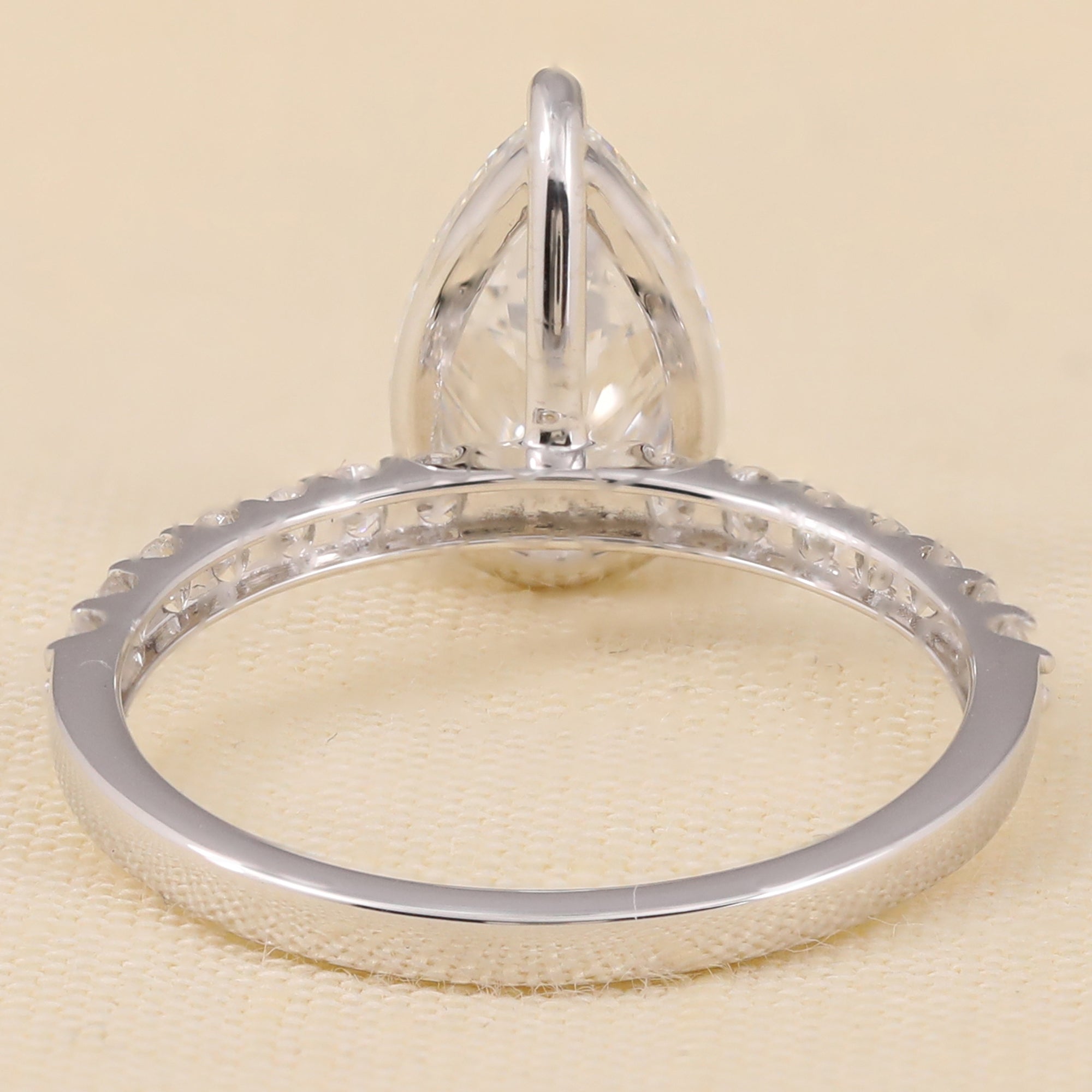 Pear centerpiece lab-grown diamond ring with pavé-set lab diamonds