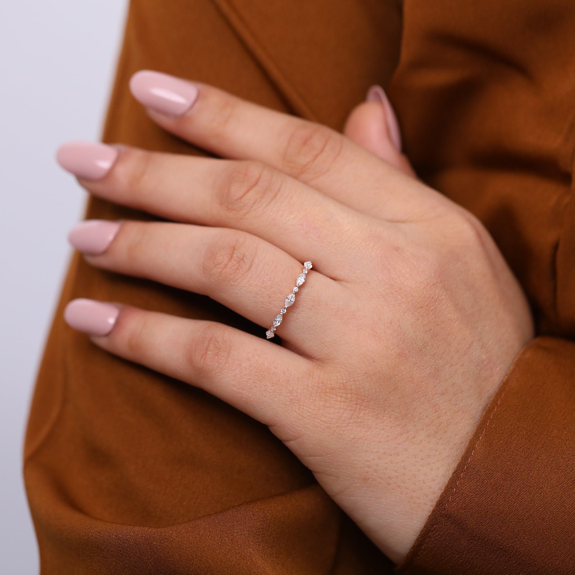 Fine jewelry rose gold band with marquise and round lab grown diamonds