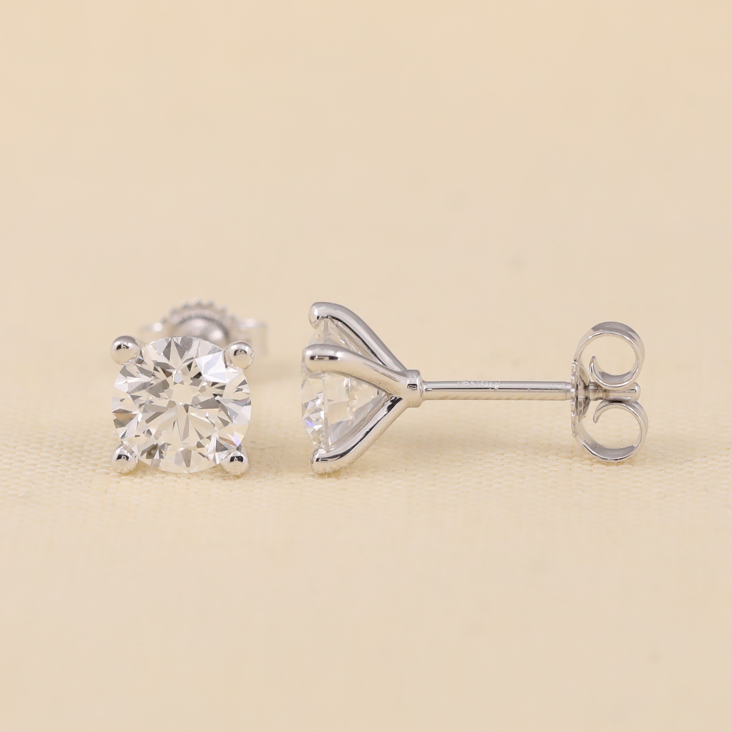 Round lab-created diamond earrings with elegant open-prong styling