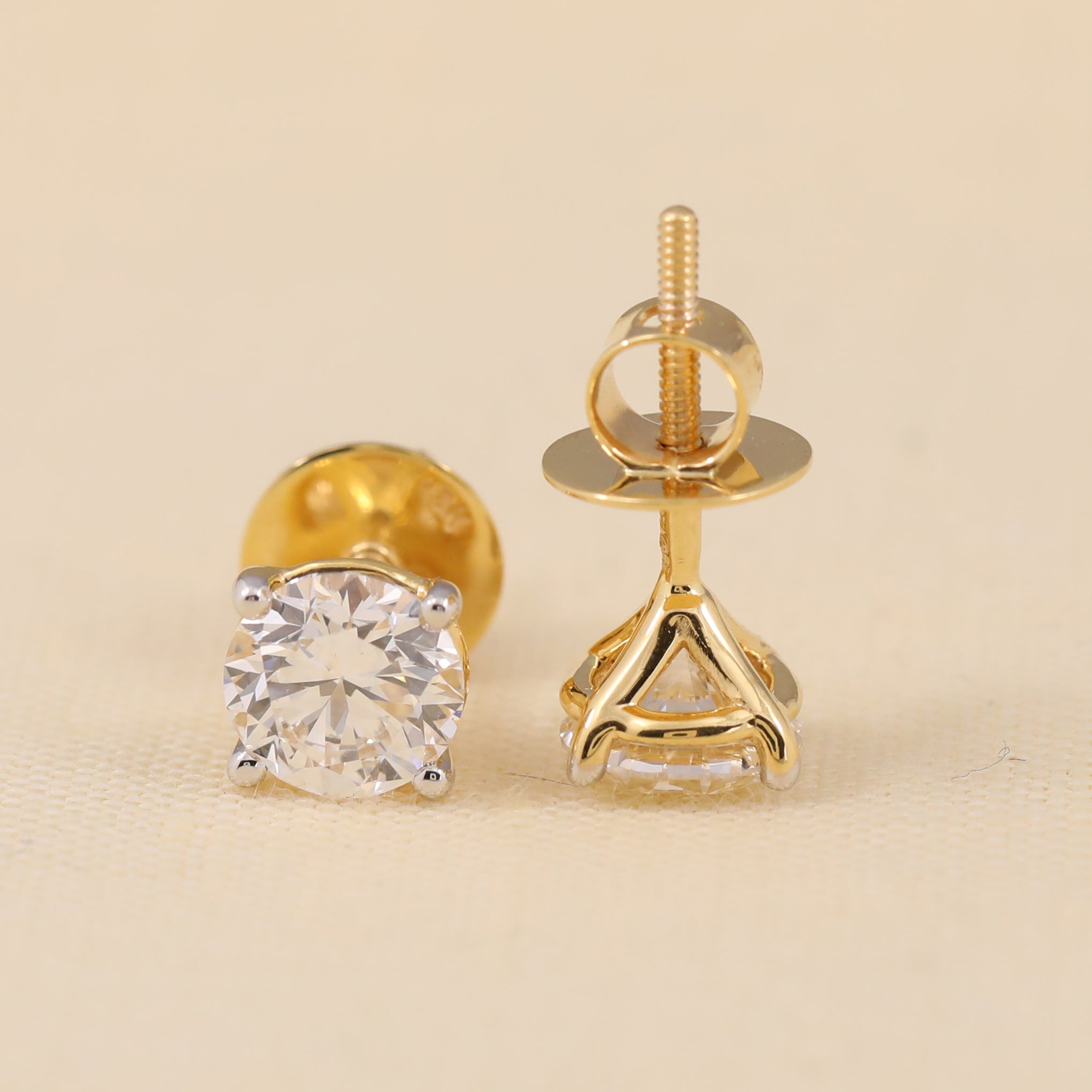 Sparkling round diamond studs perfect for birthday gifting or special events.