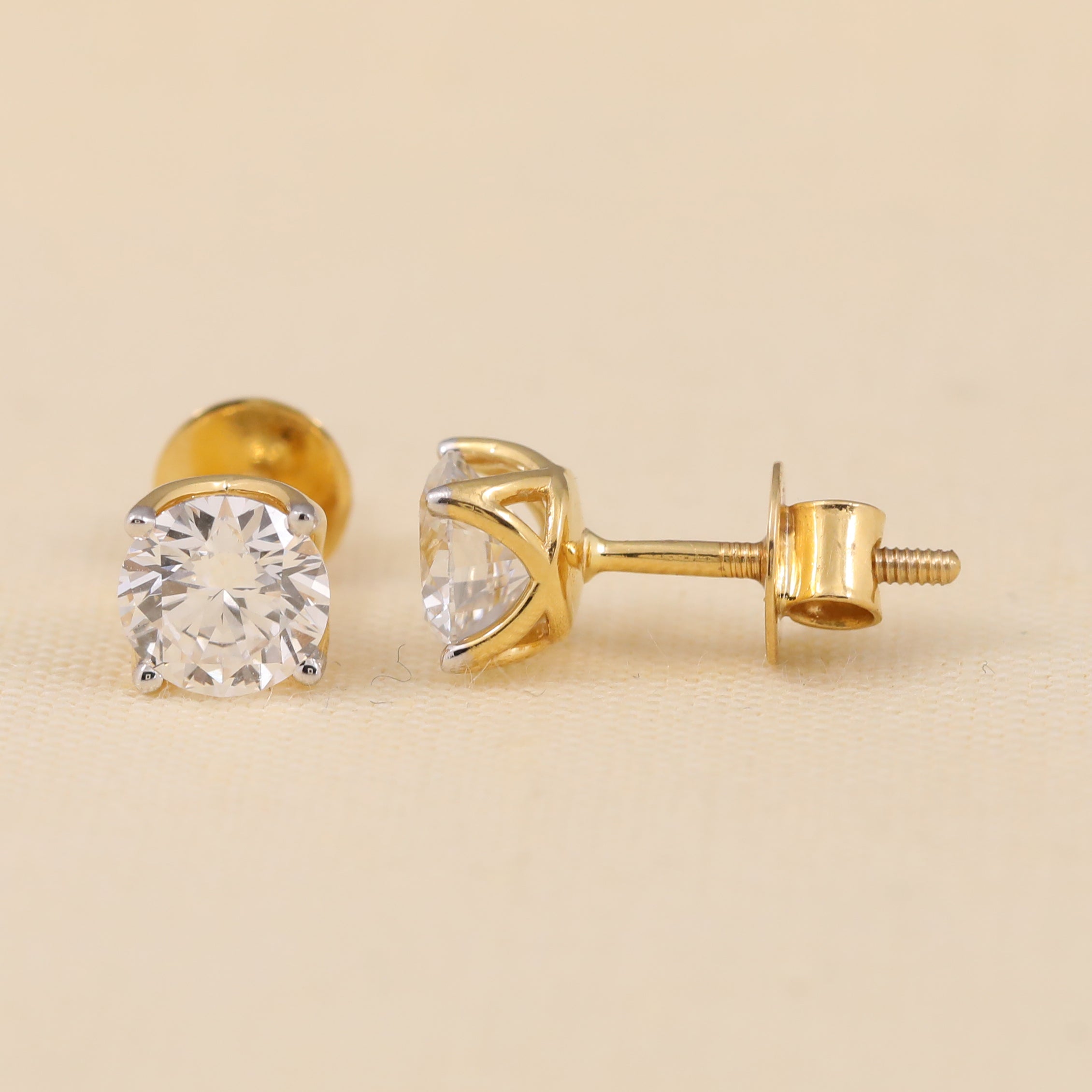 Sparkling round diamond studs perfect for birthday gifting or special events.
