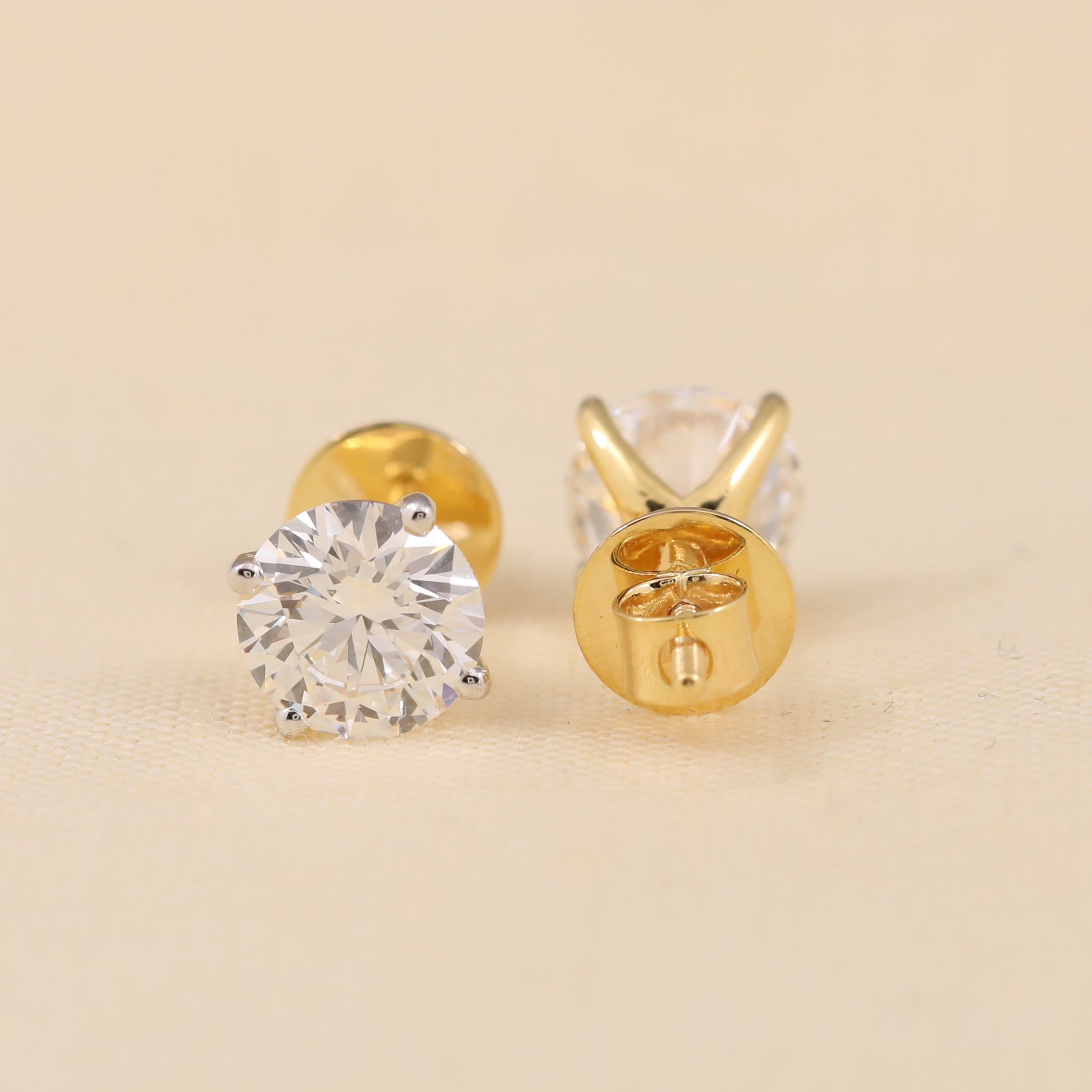 Luxury round diamond studs for women, perfect wedding and gifting jewelry.
