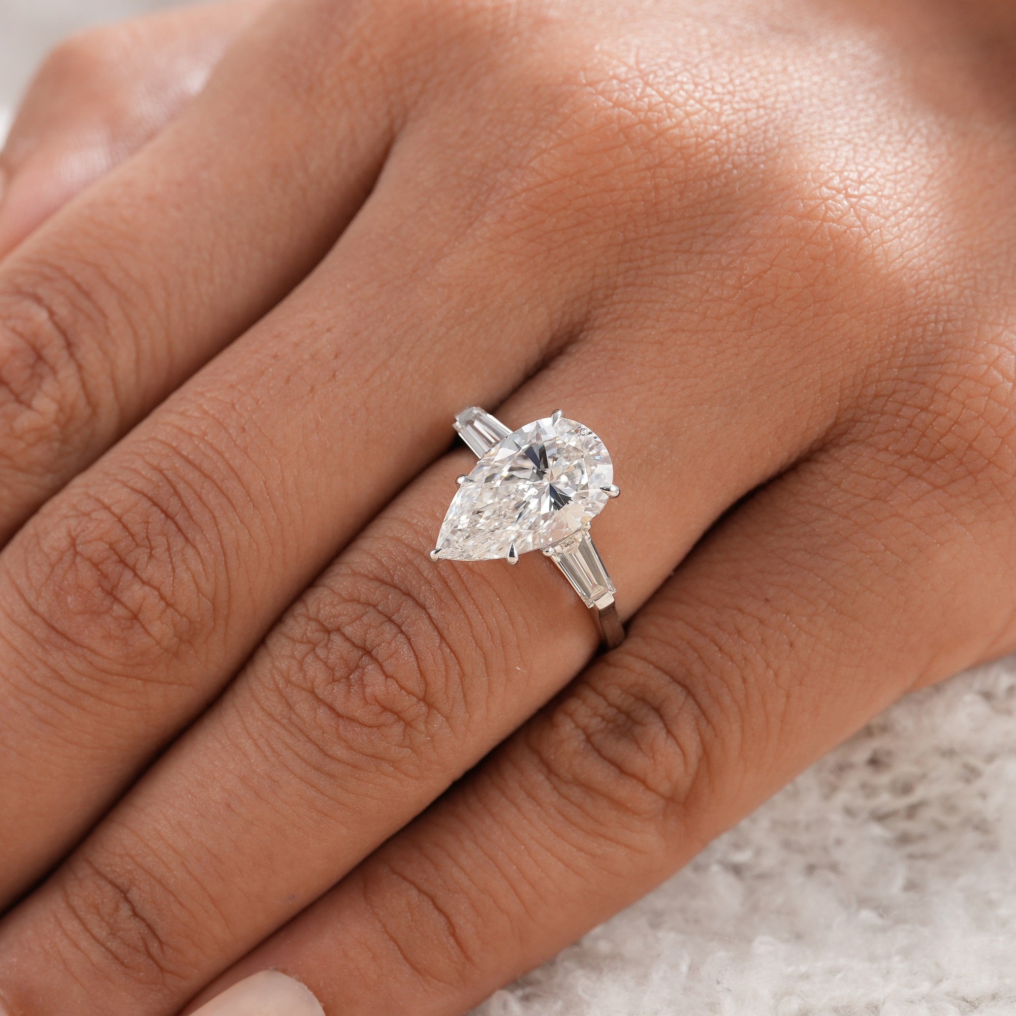 Past present future pear diamond engagement ring