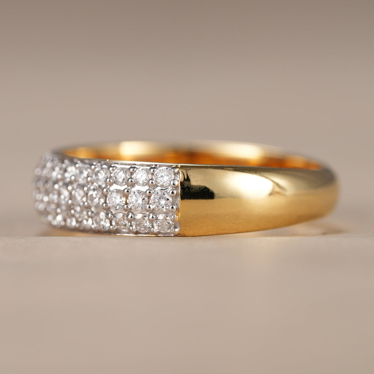 Elegant lab diamond eternity band handcrafted with three rows of brilliant round diamonds.