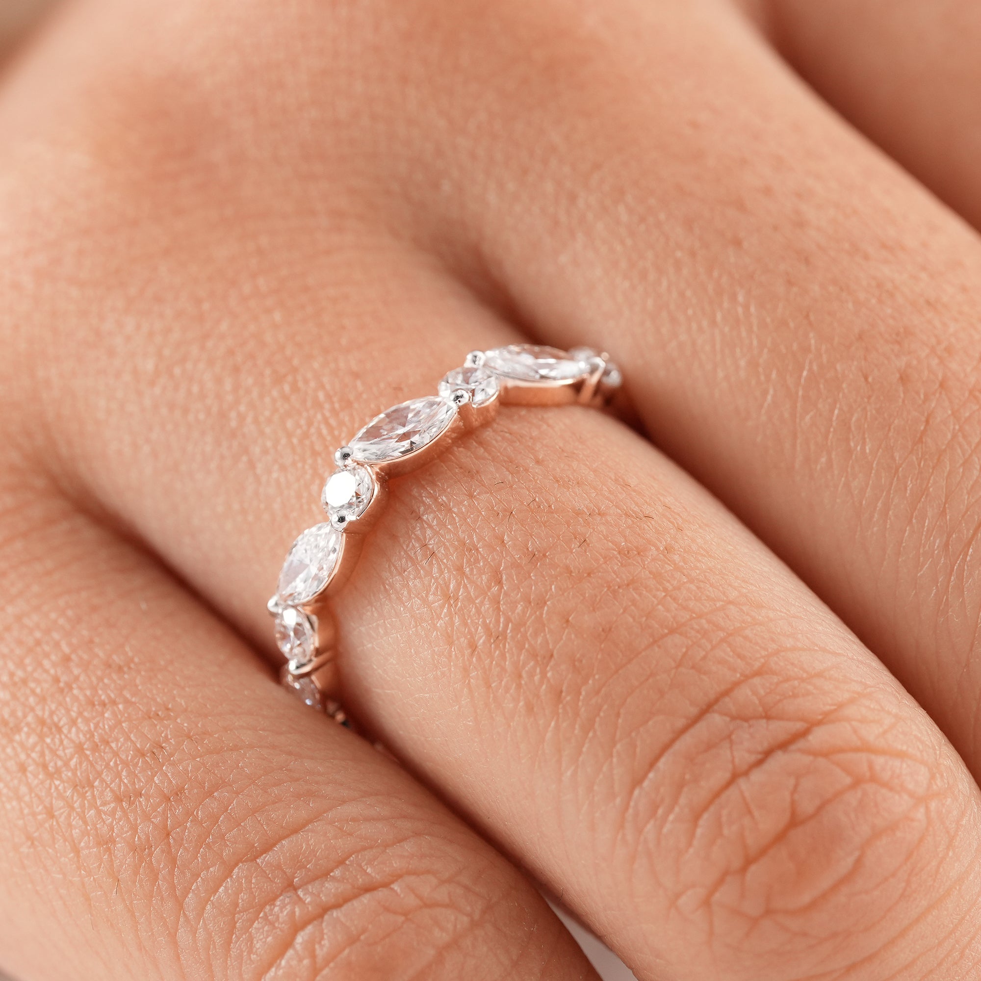 Minimalist eternity style diamond wedding band.