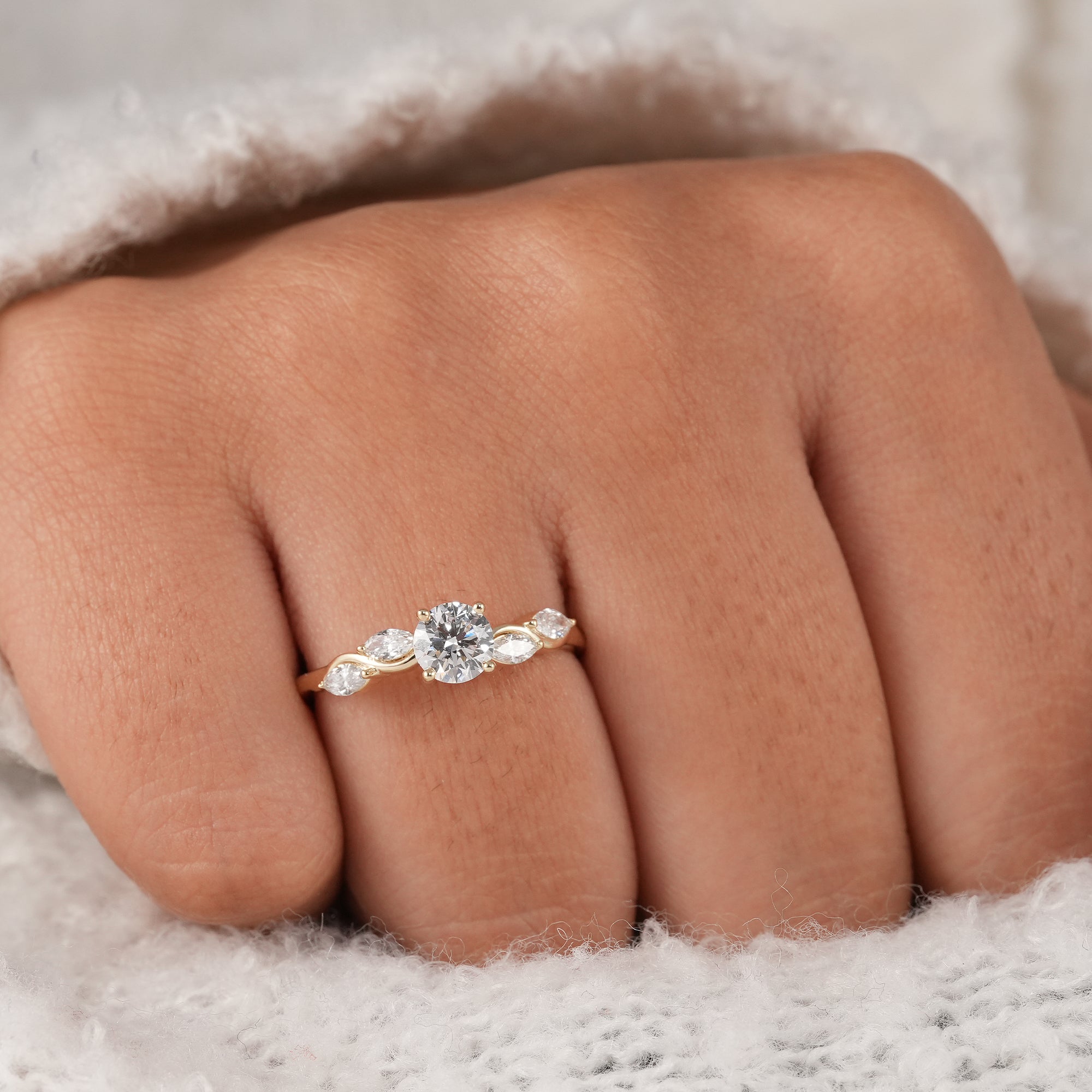 Luxury lab grown diamond engagement ring in polished yellow gold.