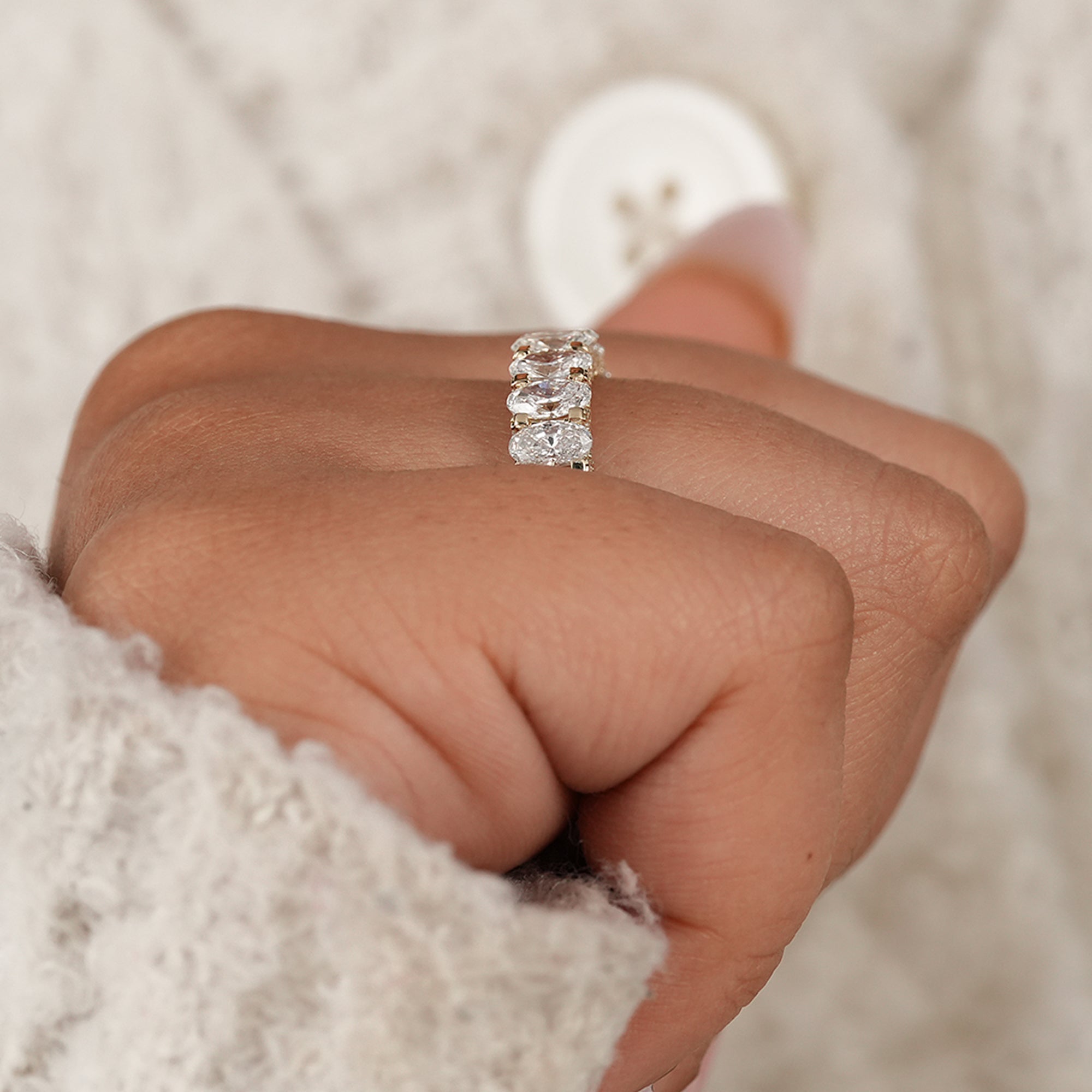 Premium oval diamond wedding ring featuring ethically sourced IGI certified lab grown diamonds.