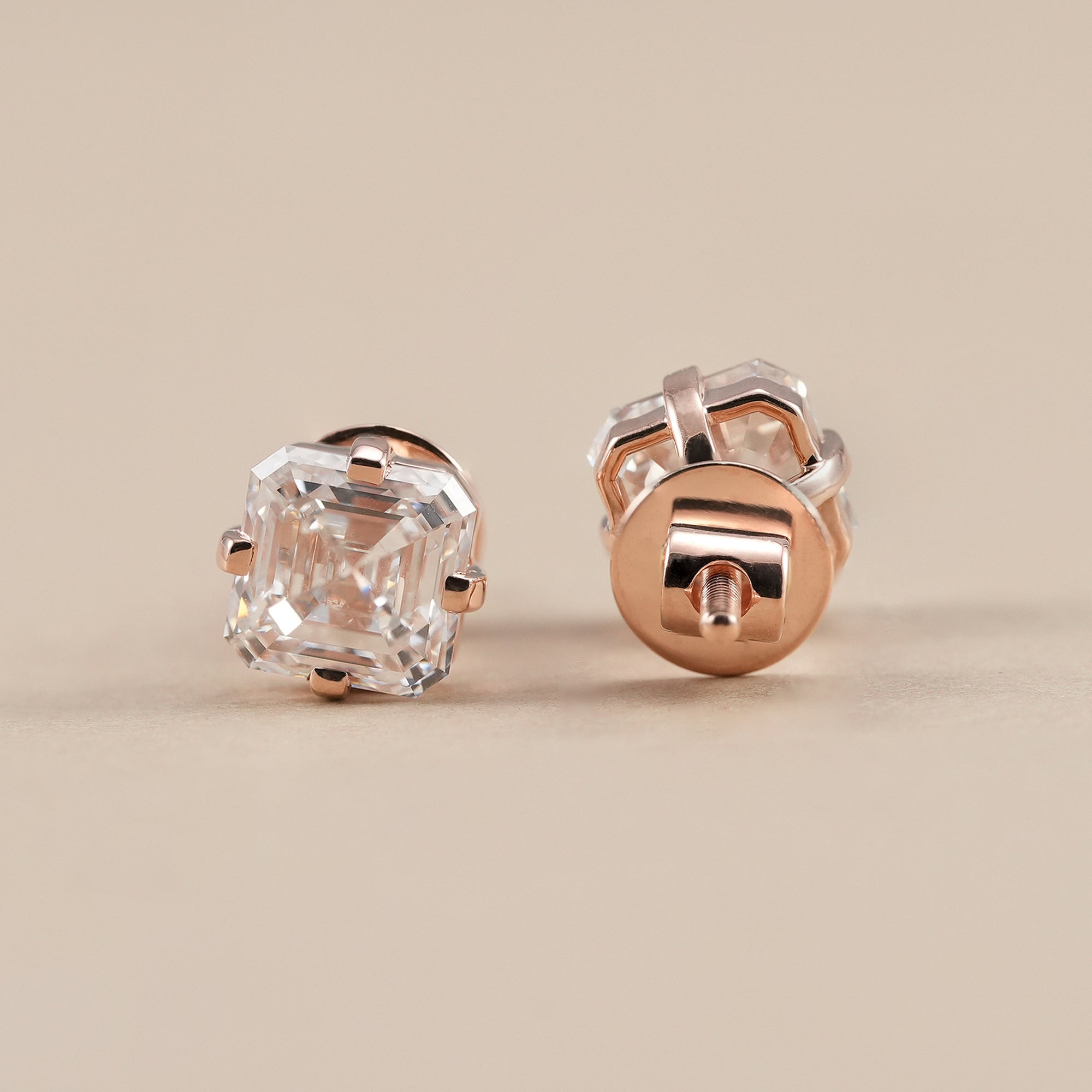 Classic Asscher lab diamond stud earrings designed with secure four-prong settings and exceptional brilliance.