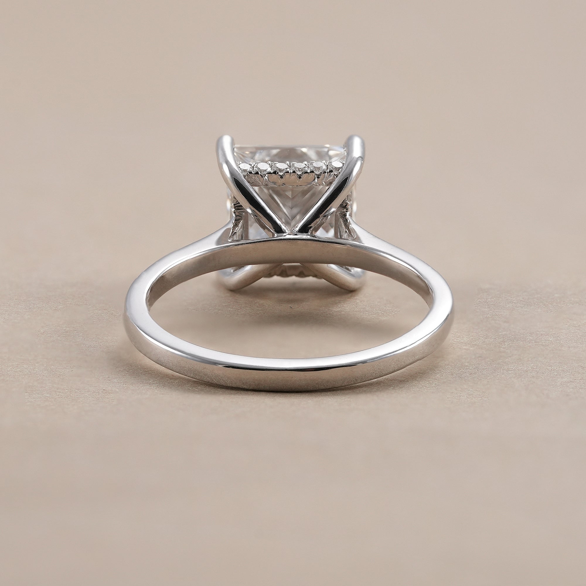 White gold princess solitaire engagement ring featuring lab grown diamond.