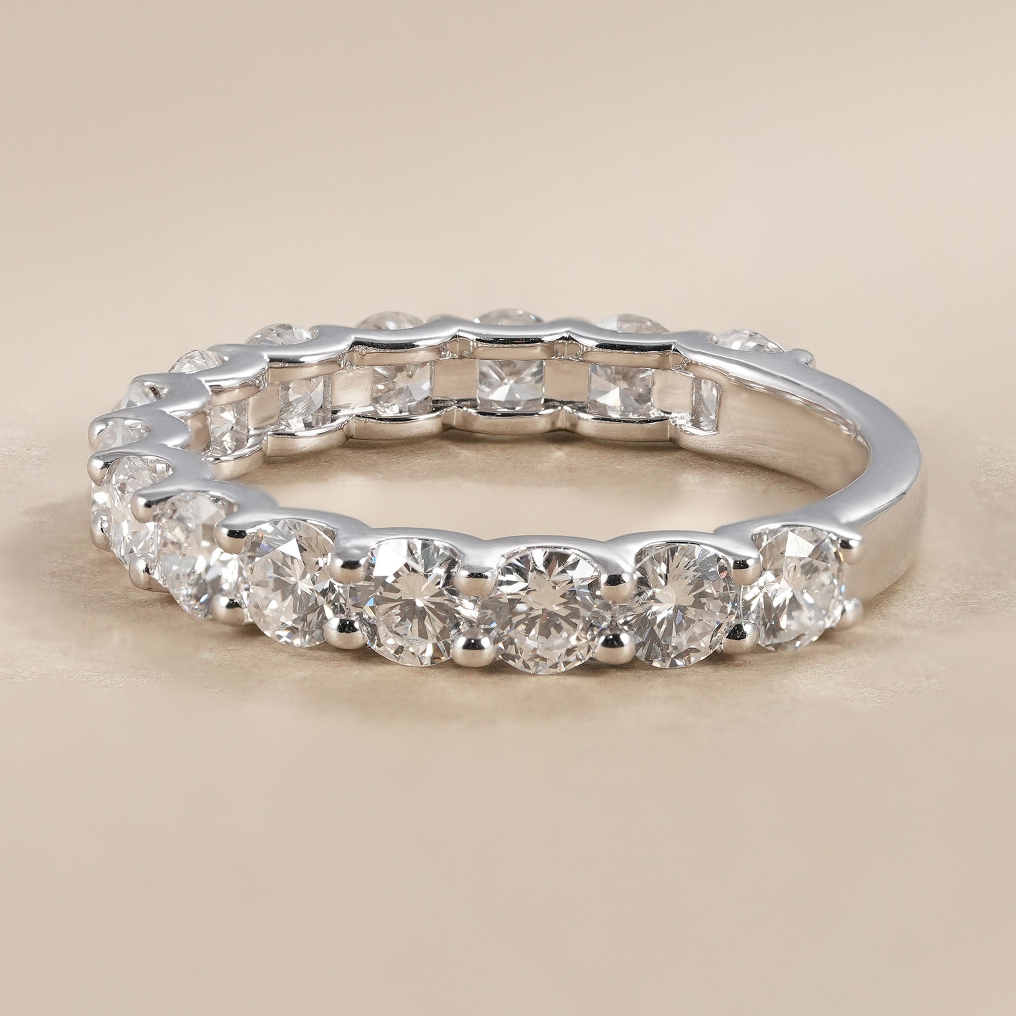 Lab grown diamond half eternity ring in shared prong setting