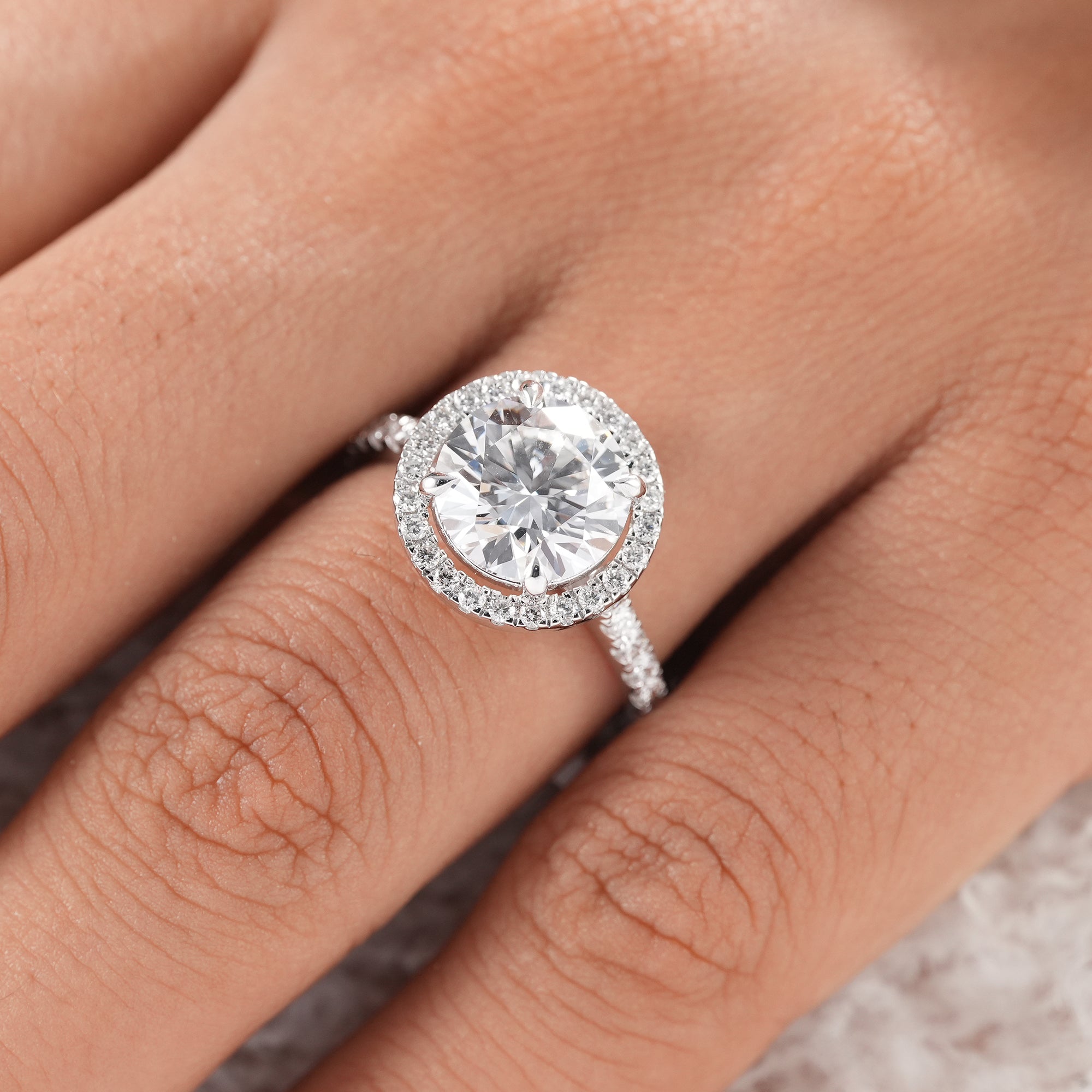Fine jewelry round lab grown diamond engagement ring.