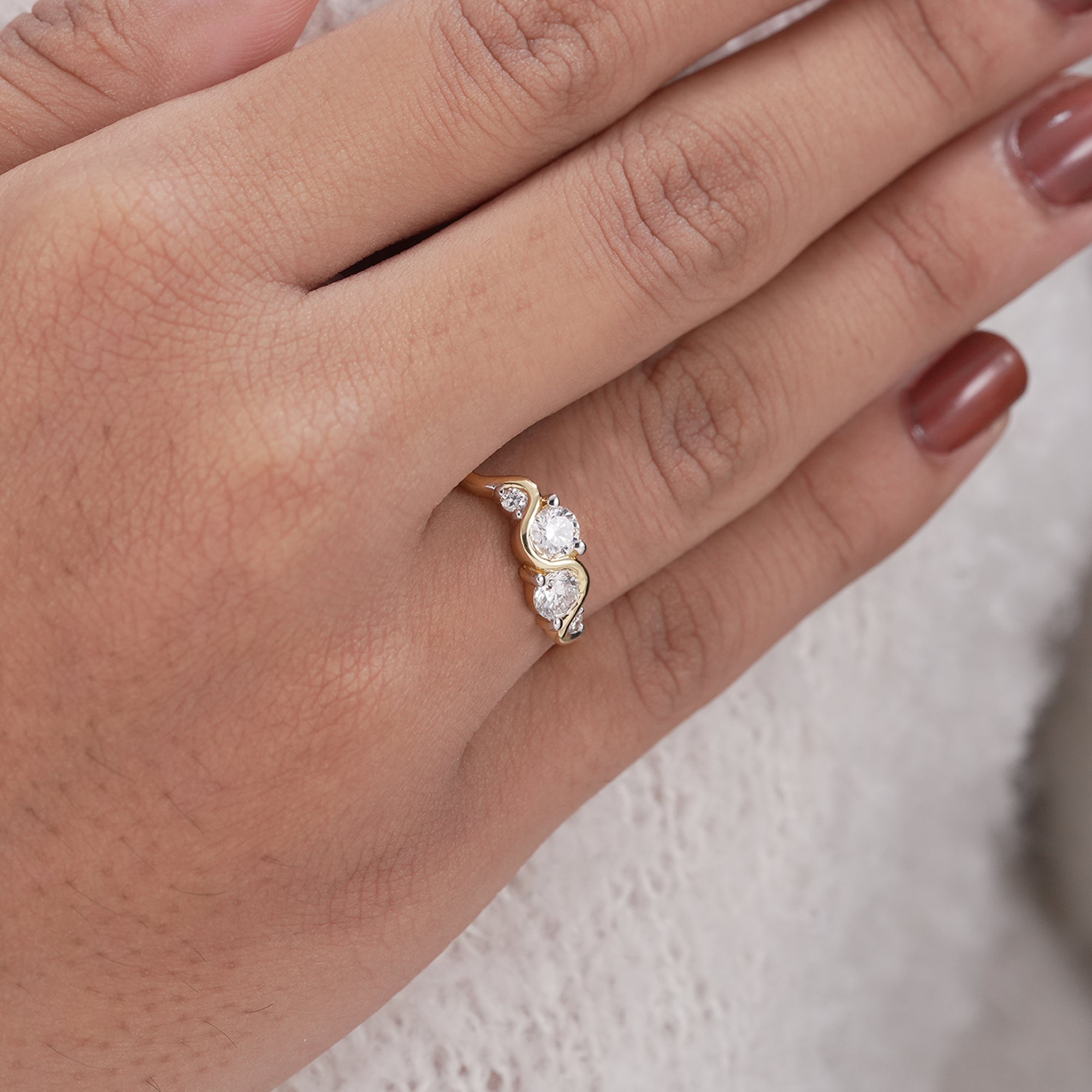 Curved bridal diamond band designed for engagement ring stacking.