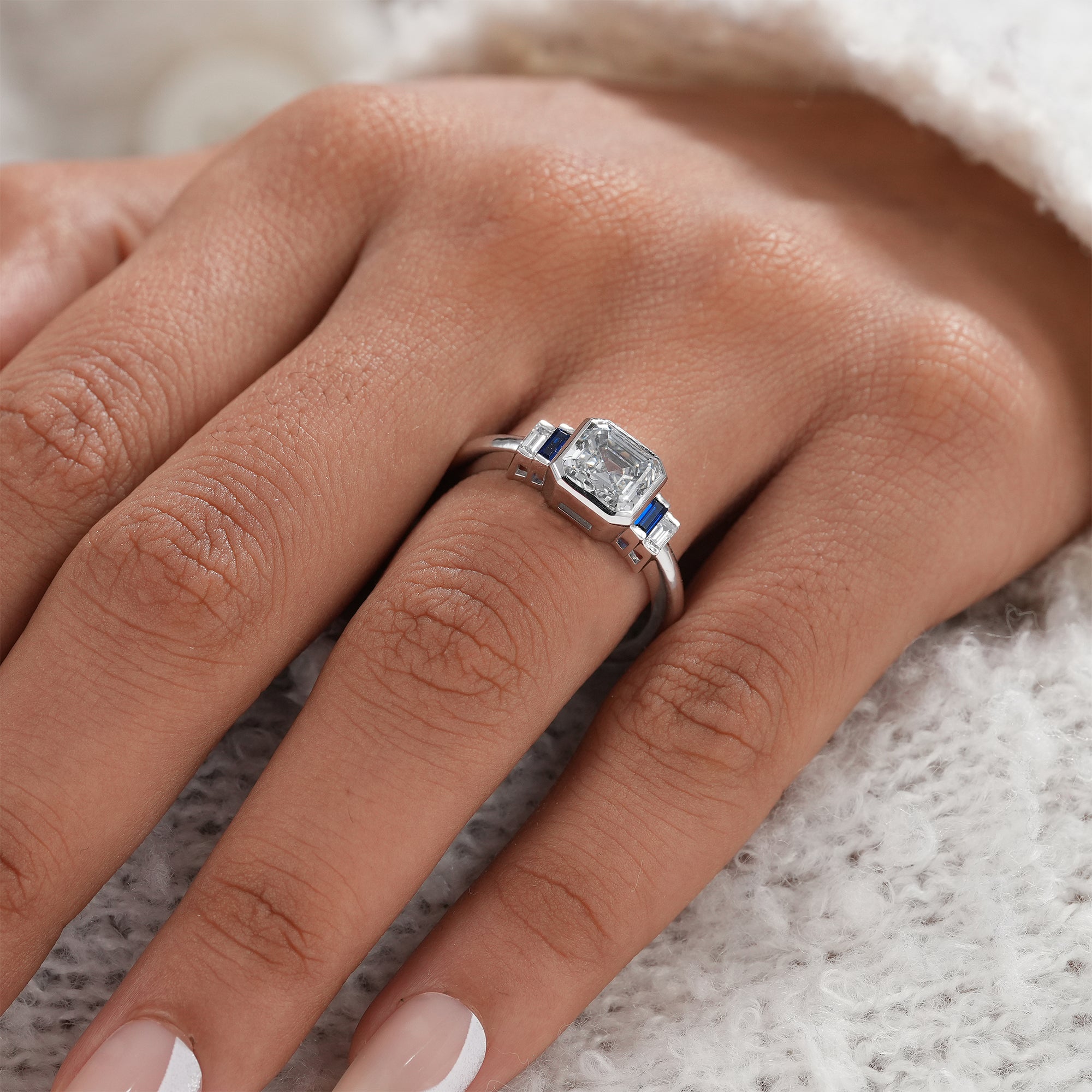 Sustainable bezel set lab diamond engagement ring for women.