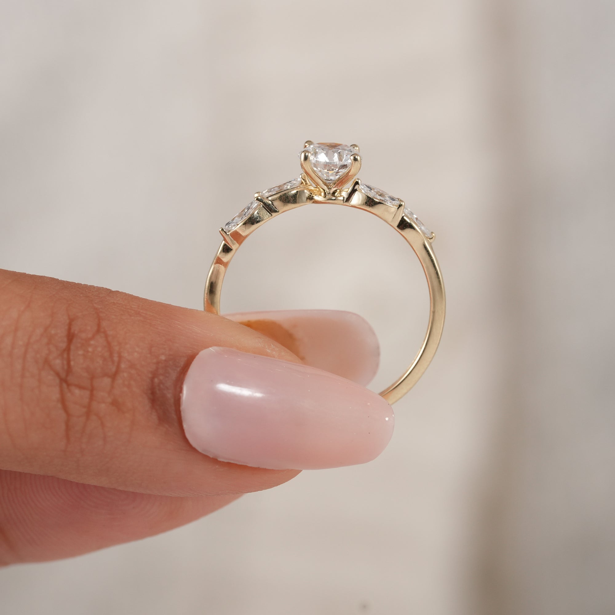 Classic wave shank diamond ring for bridal jewelry.