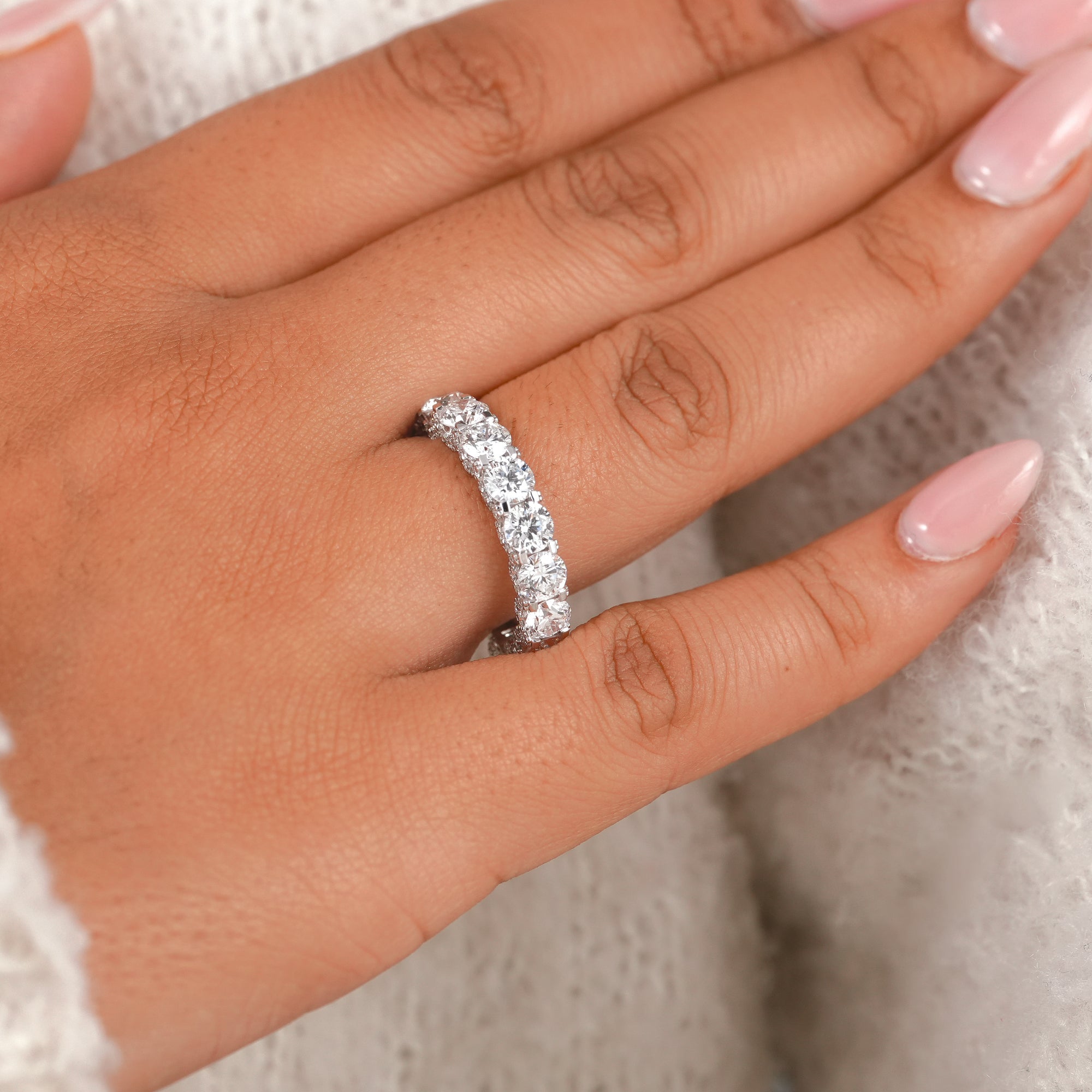 Handcrafted IGI certified round diamond wedding band featuring continuous brilliance in a full eternity design.