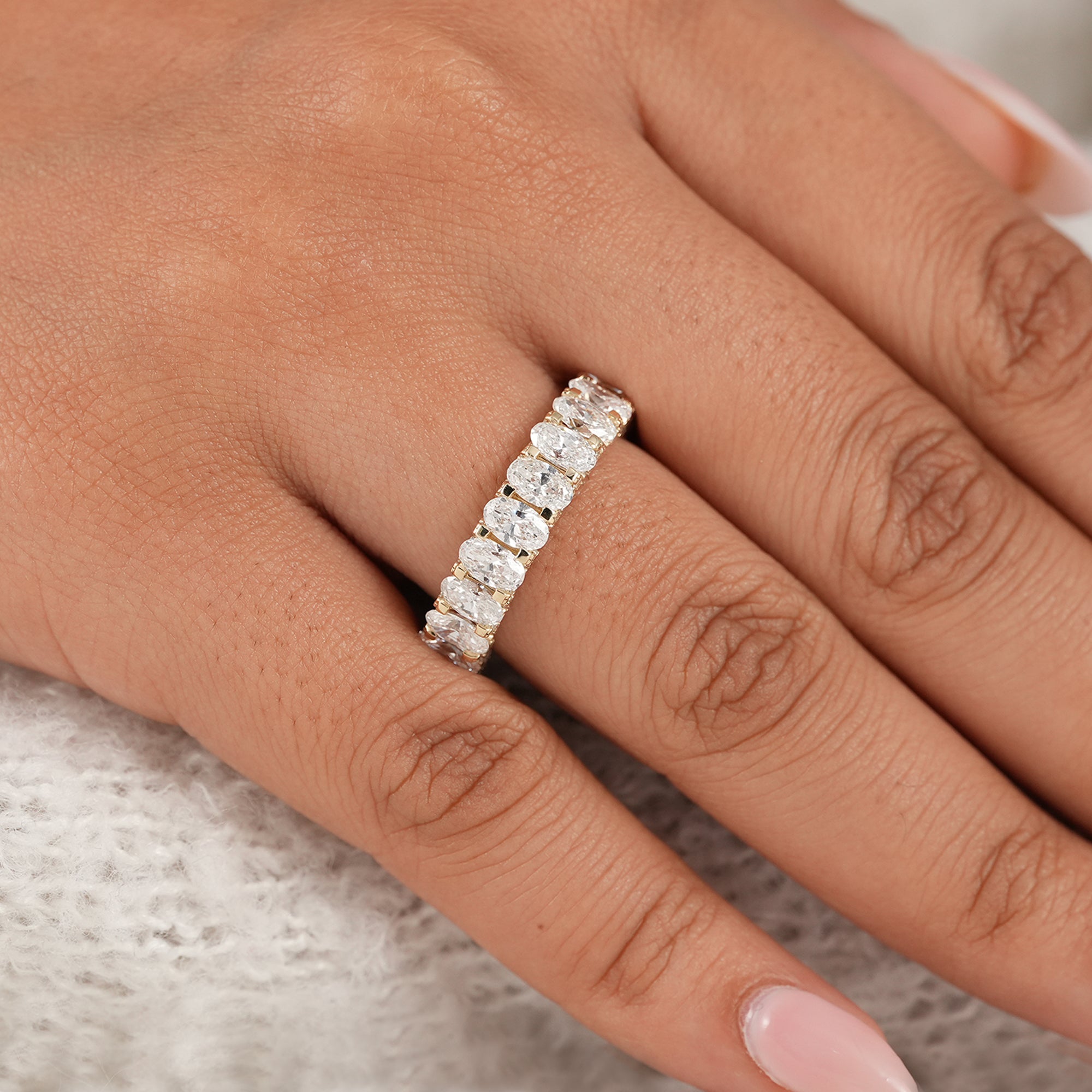 Stackable oval lab diamond wedding band featuring brilliant full eternity diamond design.