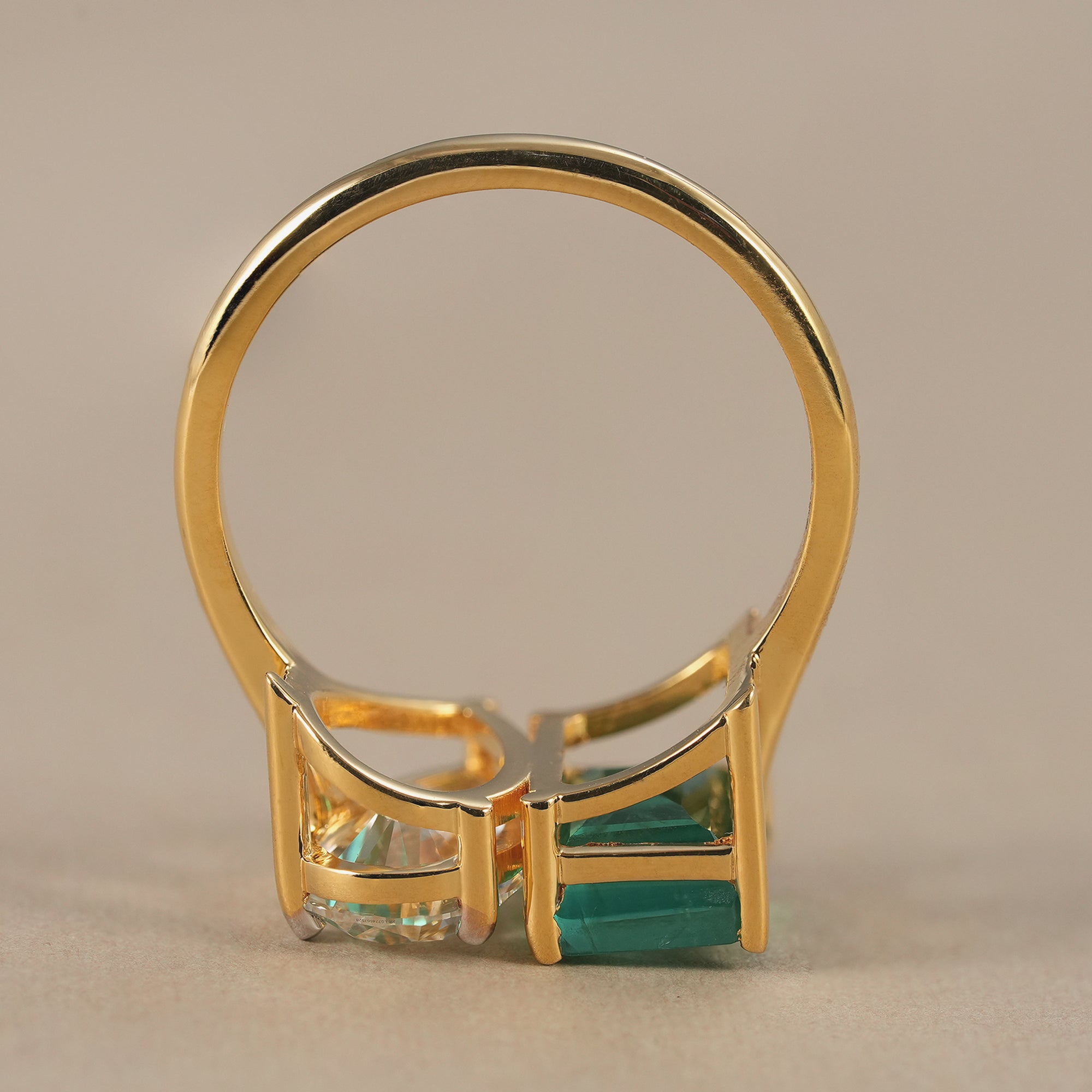 Modern Toi et Moi wedding ring with emerald and pear diamonds
