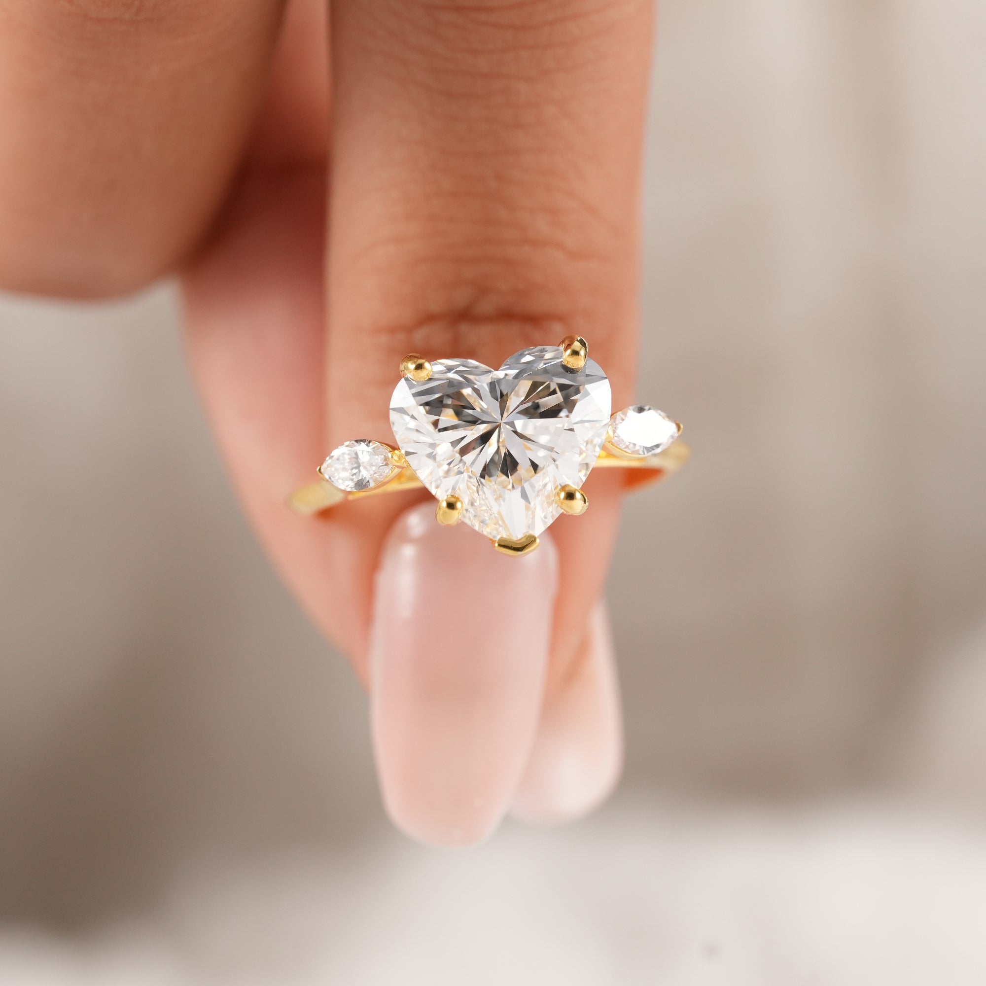 Fine jewelry heart lab diamond ring in yellow gold.