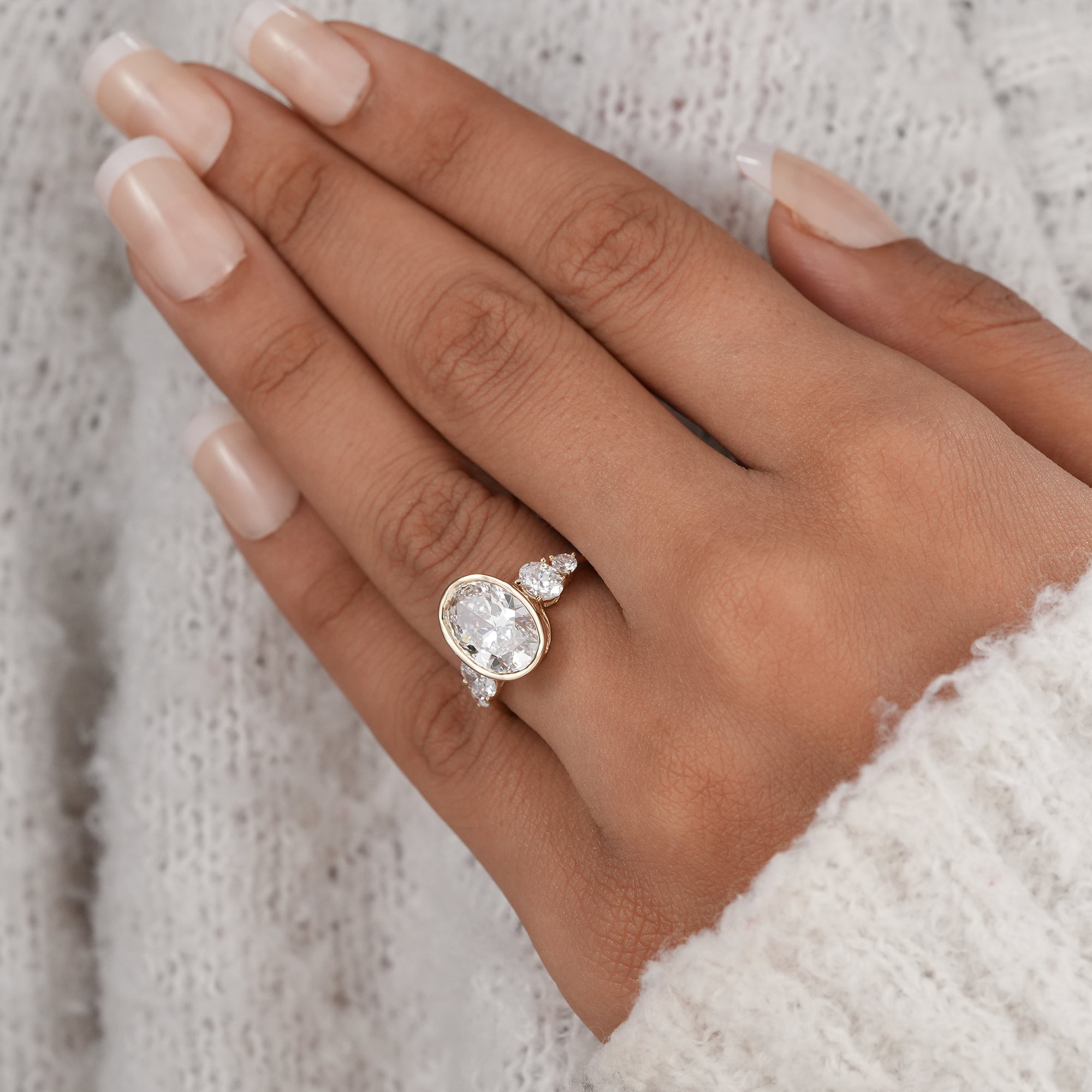 Luxury lab grown diamond ring with oval center stone