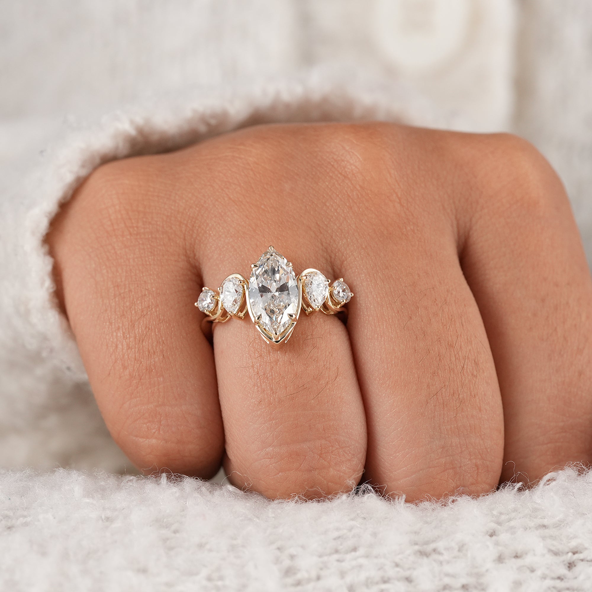 Solid gold marquise diamond proposal ring