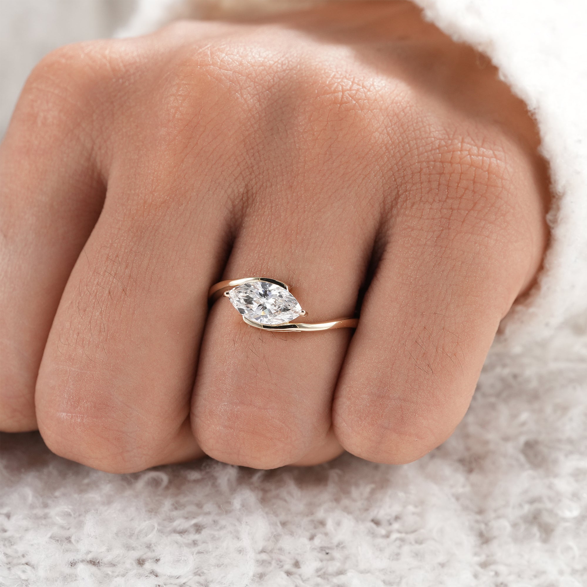 Fine jewelry marquise solitaire diamond ring.