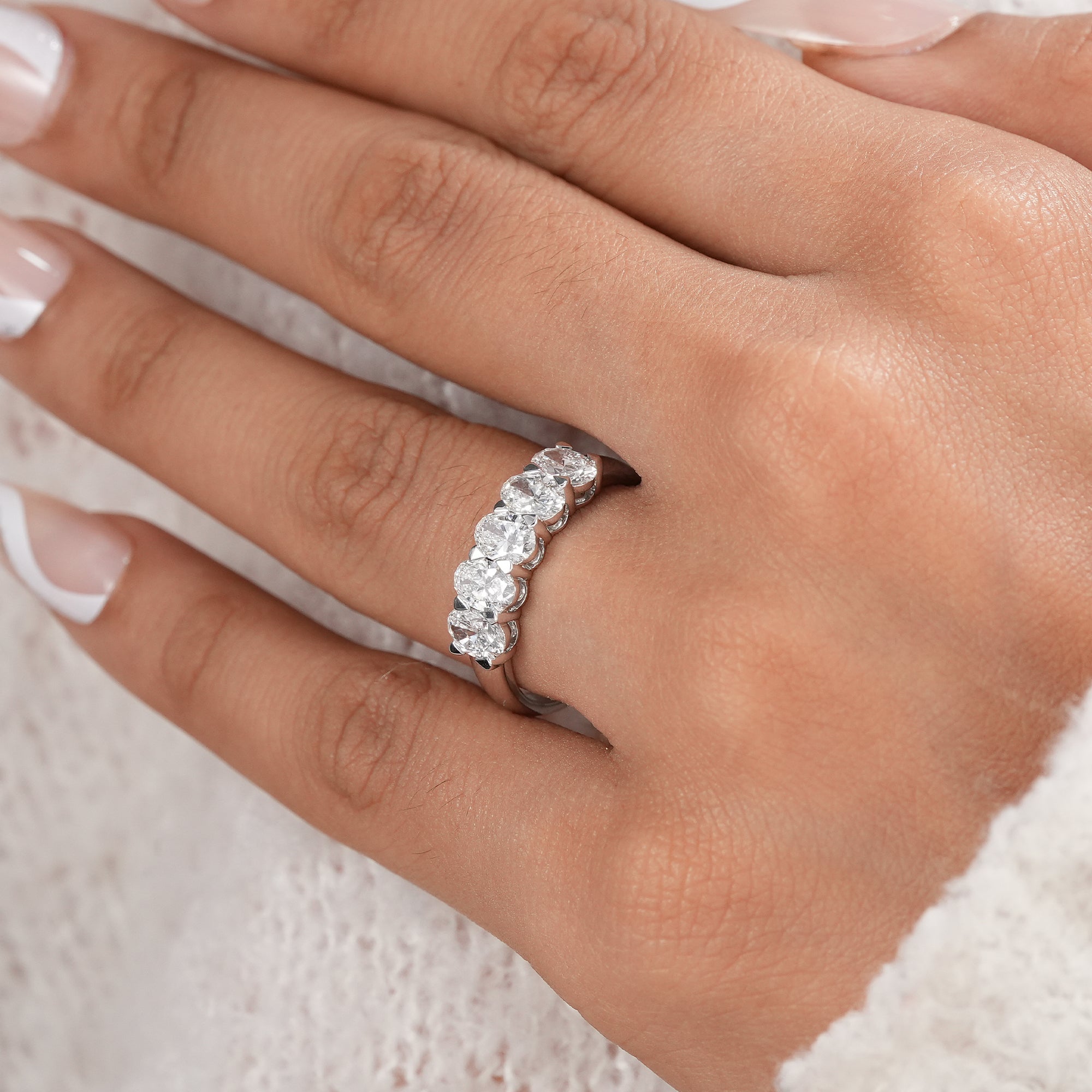Luxury oval lab diamond half eternity ring.