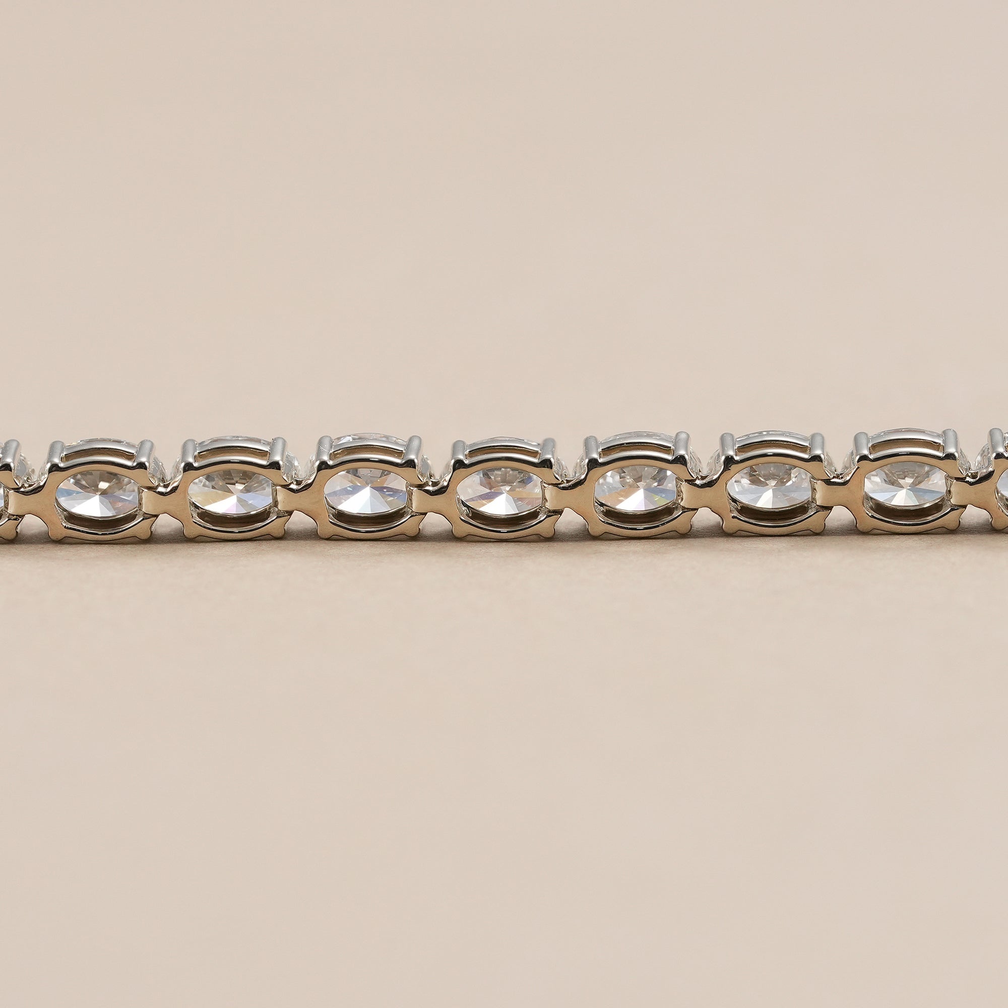 East west oval lab diamond bracelet with brilliant sparkle.