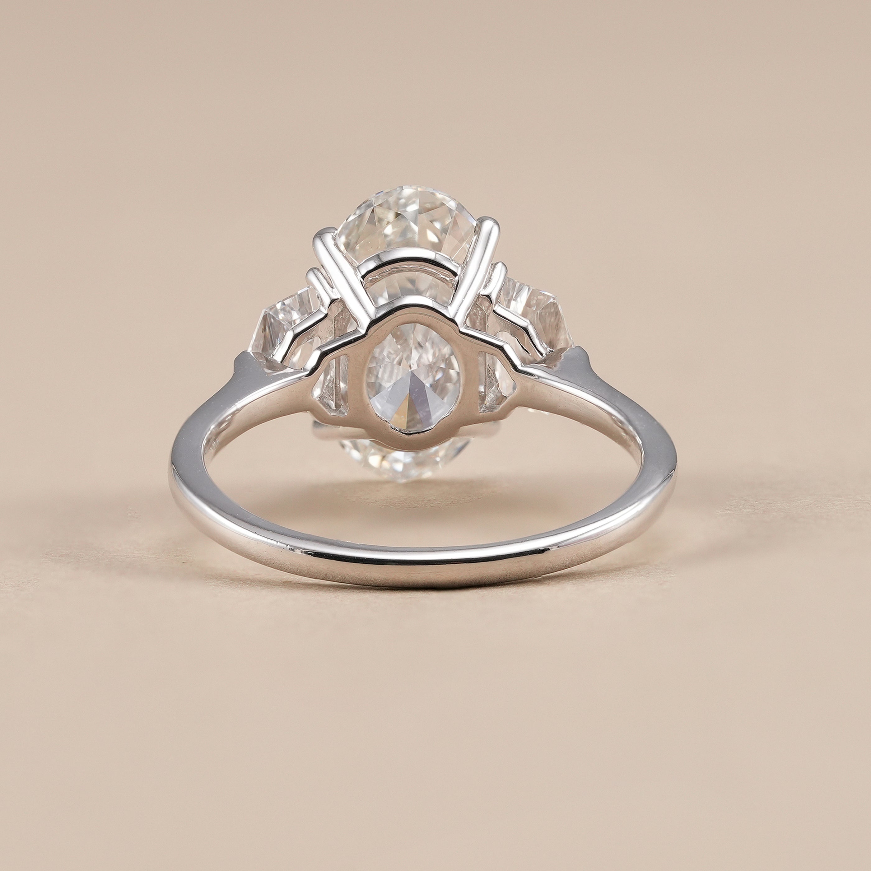 Oval lab grown diamond wedding ring with three stone design