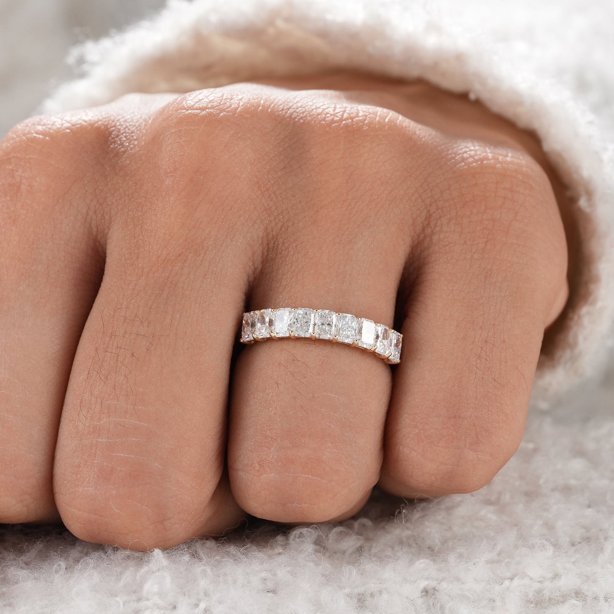 Fine jewelry radiant diamond wedding ring.