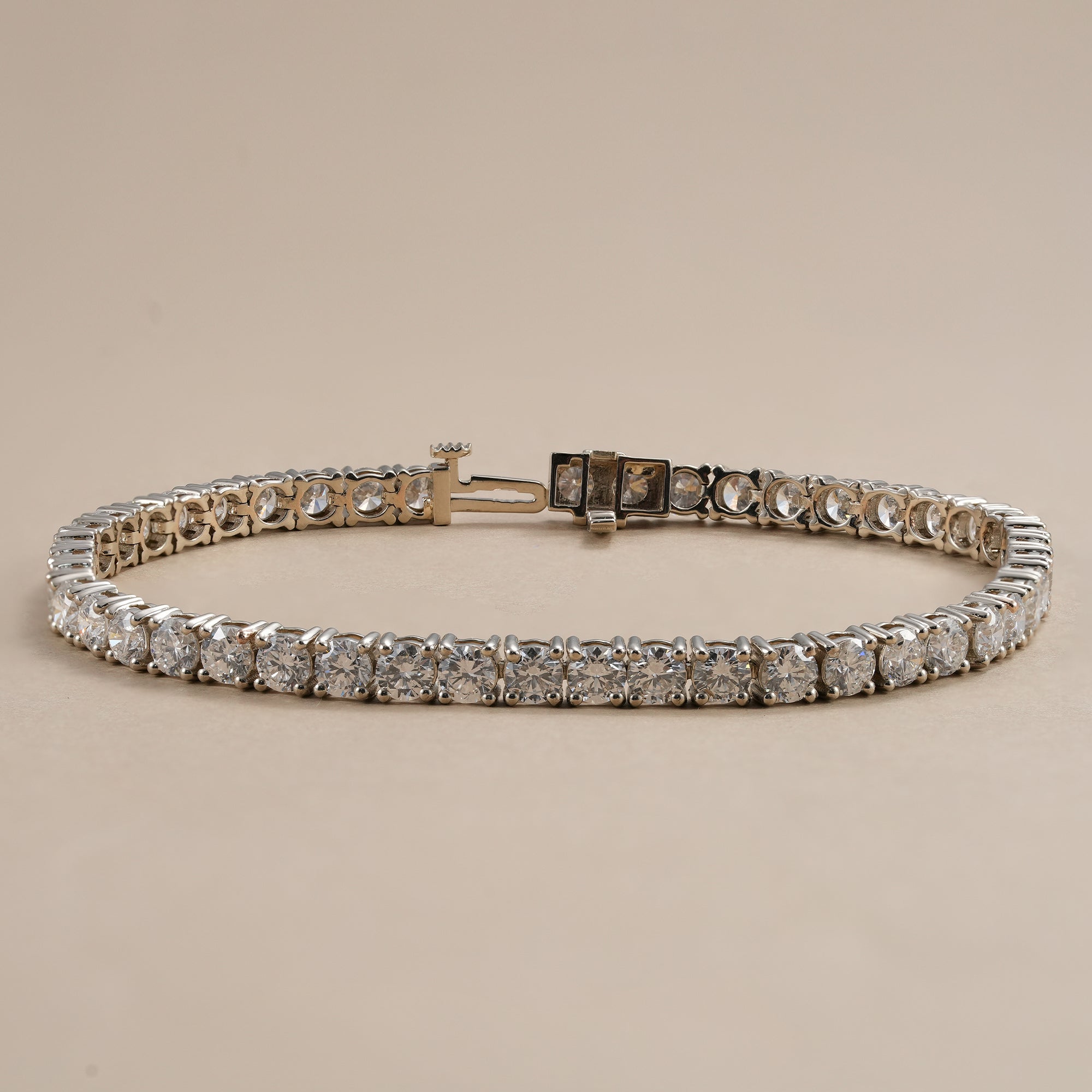 Handcrafted round brilliant lab diamond tennis bracelet.
