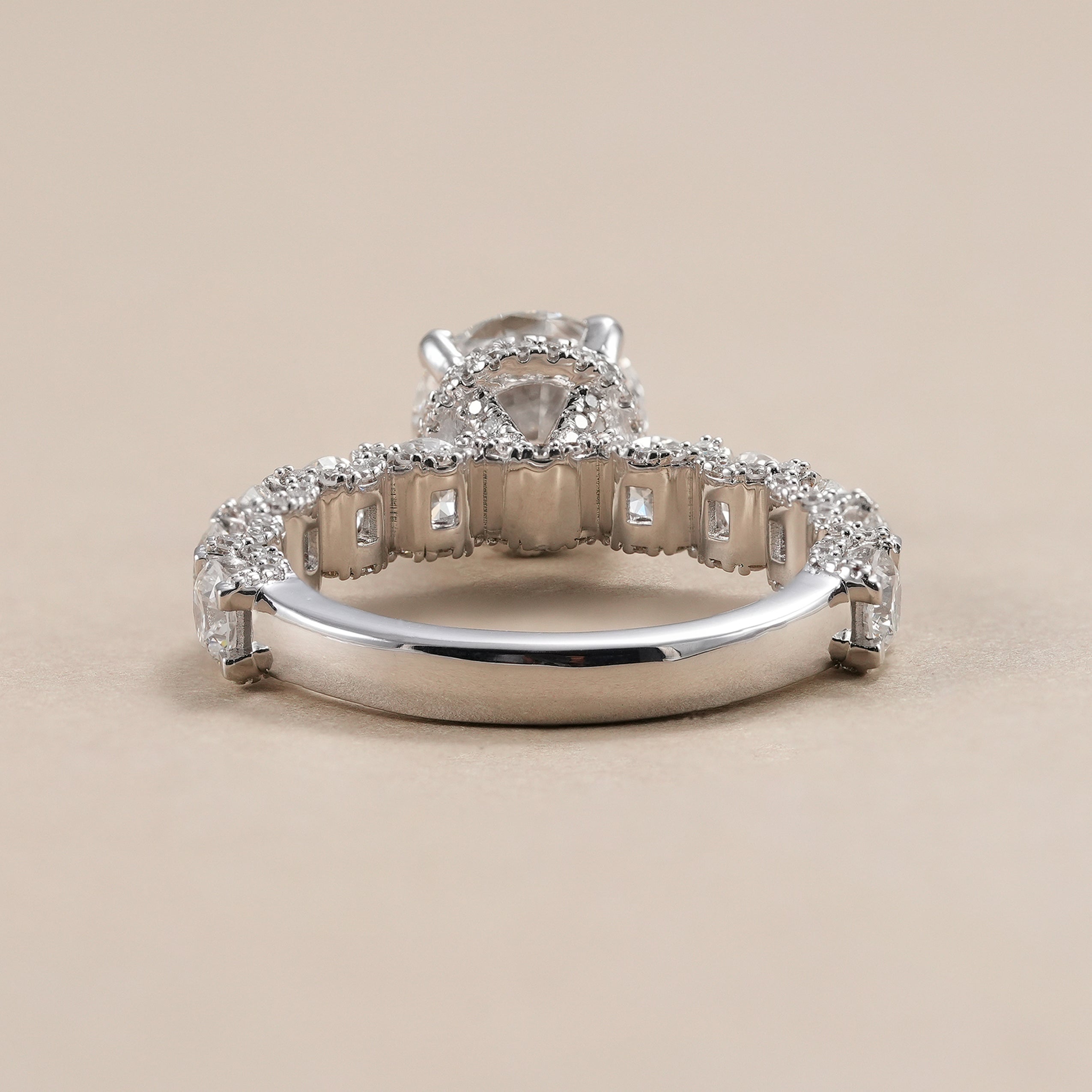 Round lab grown diamond bridal ring with sparkling diamond accents.