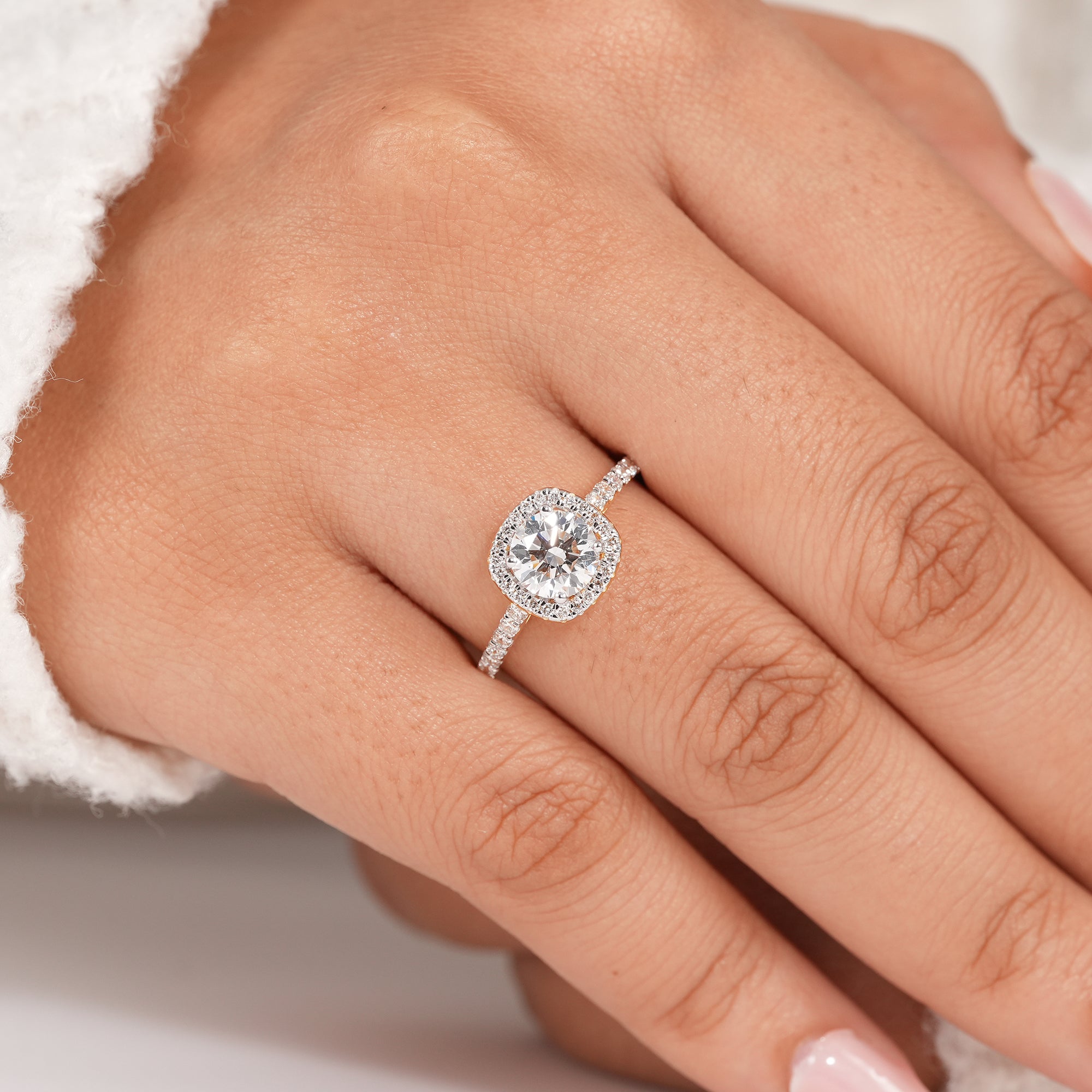 Classic round halo diamond ring with sparkling accent diamonds