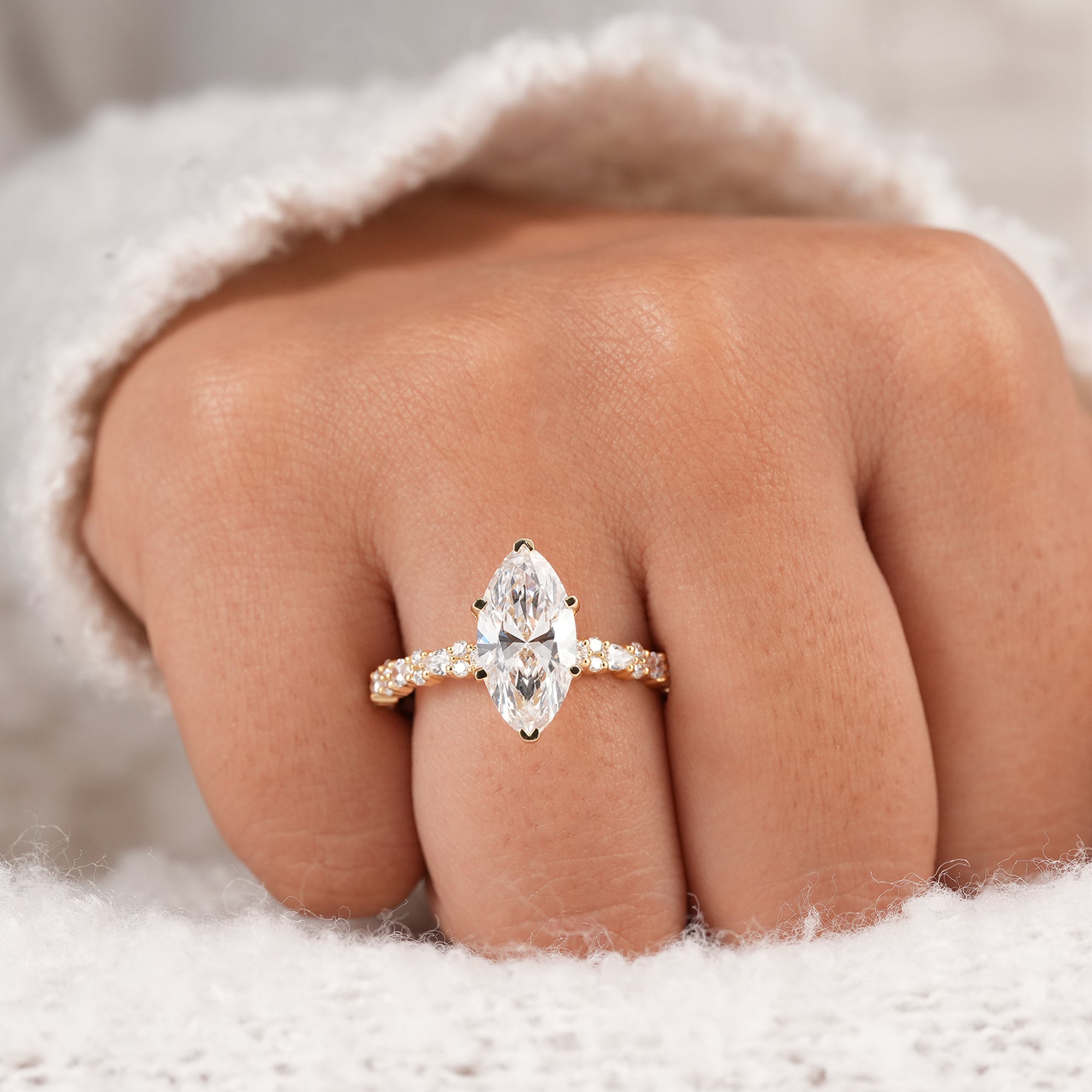 Marquise cut lab diamond ring with six prong setting