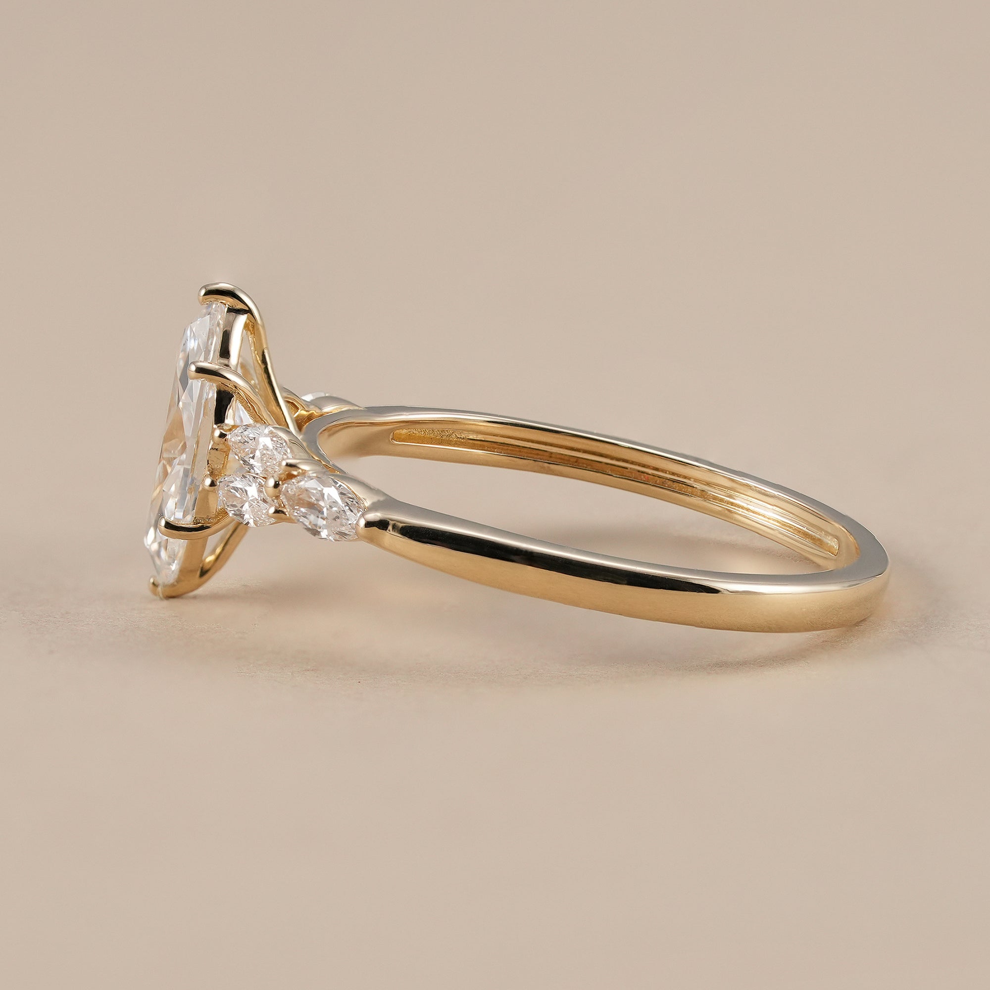Elegant marquise engagement ring with side accent diamonds