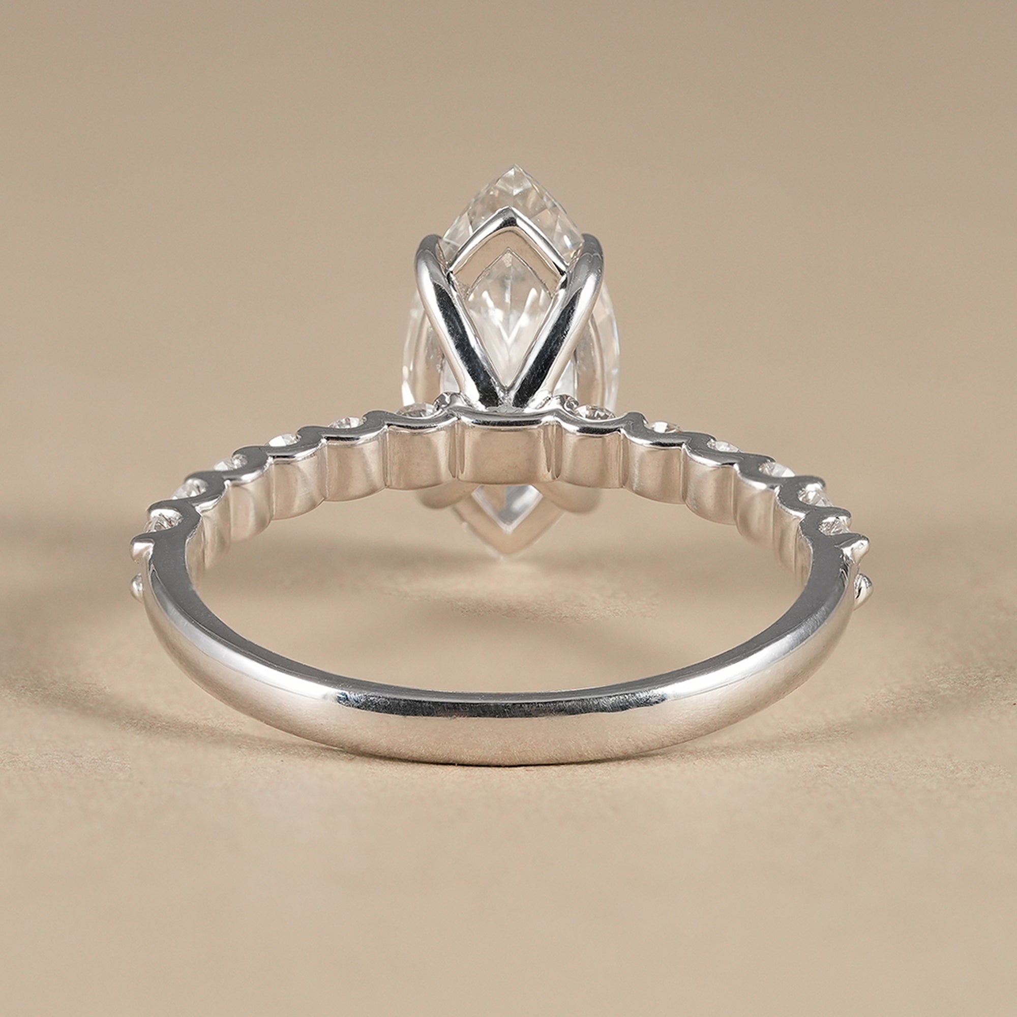 Luxury marquise diamond ring with round accent stone band