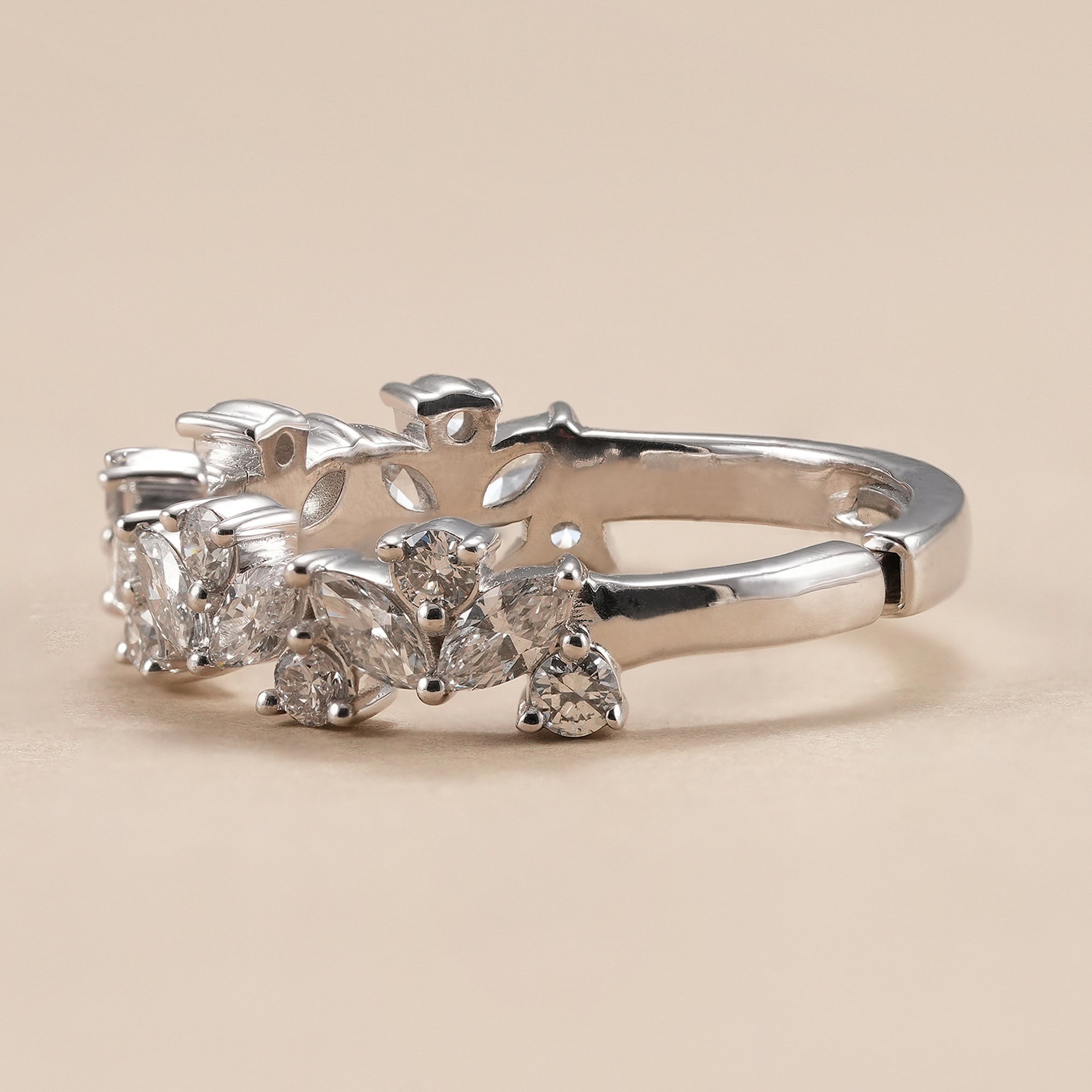 Leaf motif lab diamond eternity ring with marquise and round diamonds.