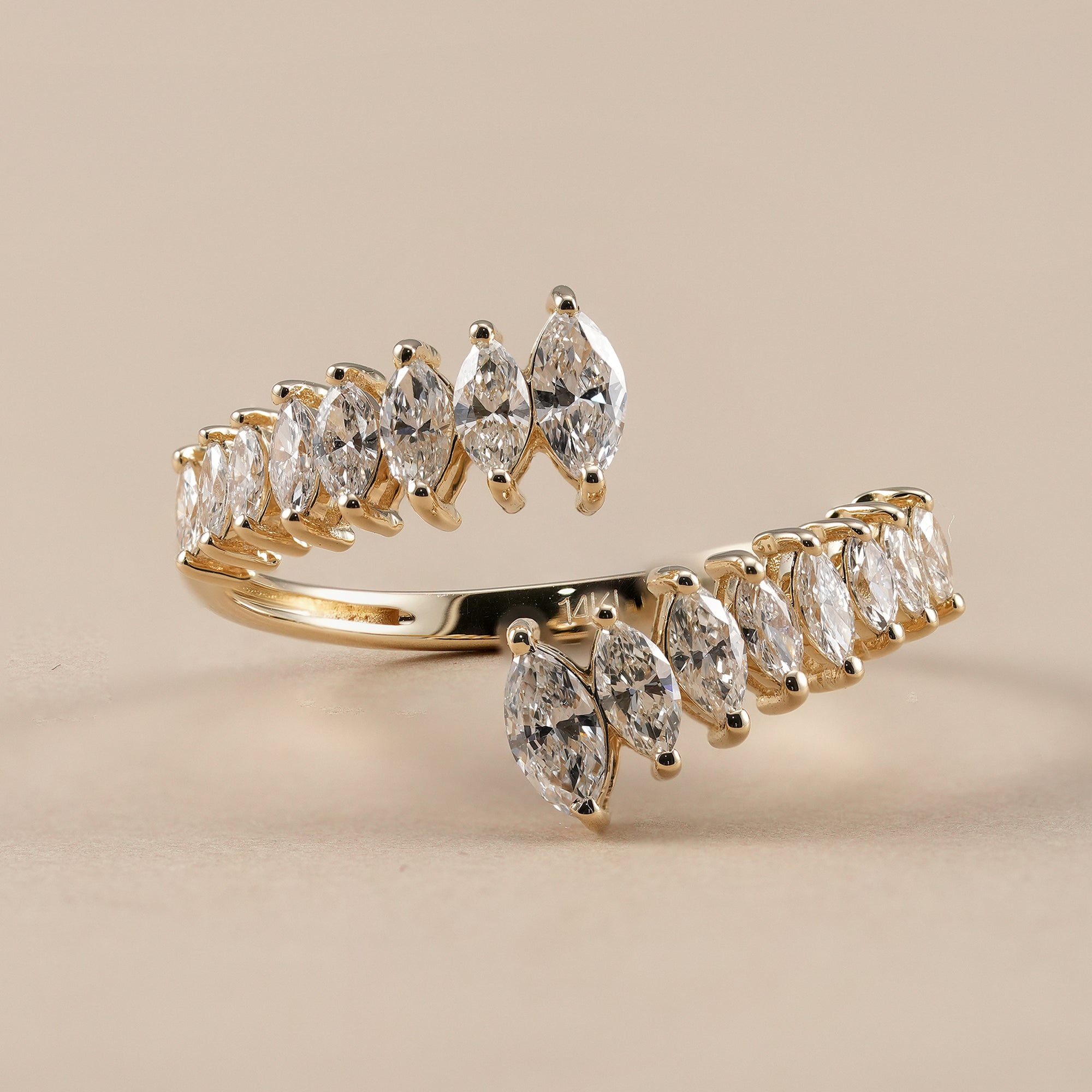 Marquise lab diamond open wedding band in yellow gold