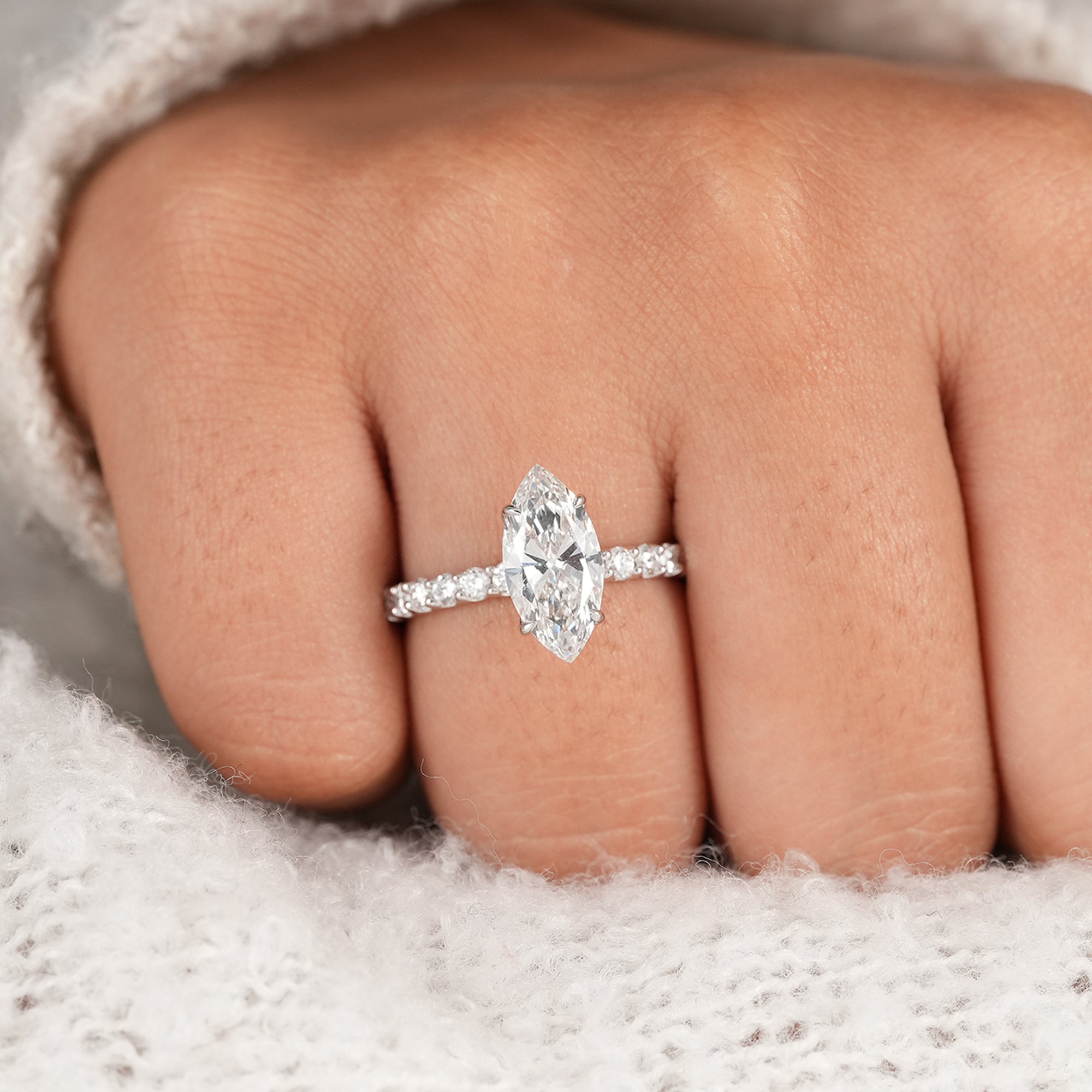 Women's marquise lab diamond wedding ring with sparkling accents