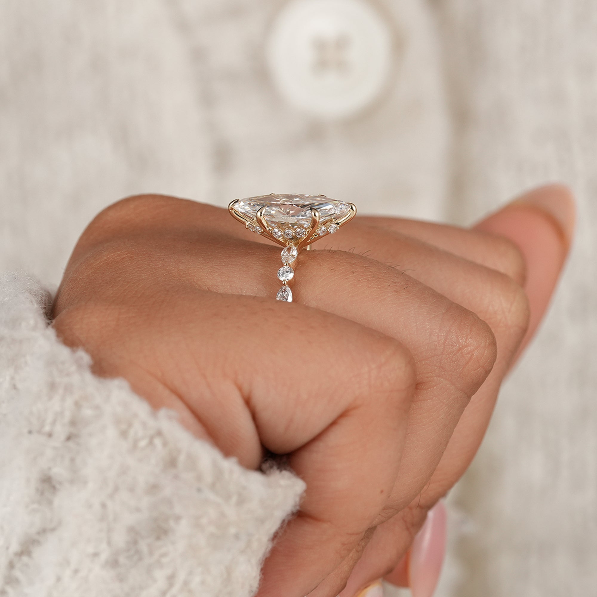 Marquise cocktail ring with hidden halo and accent diamonds