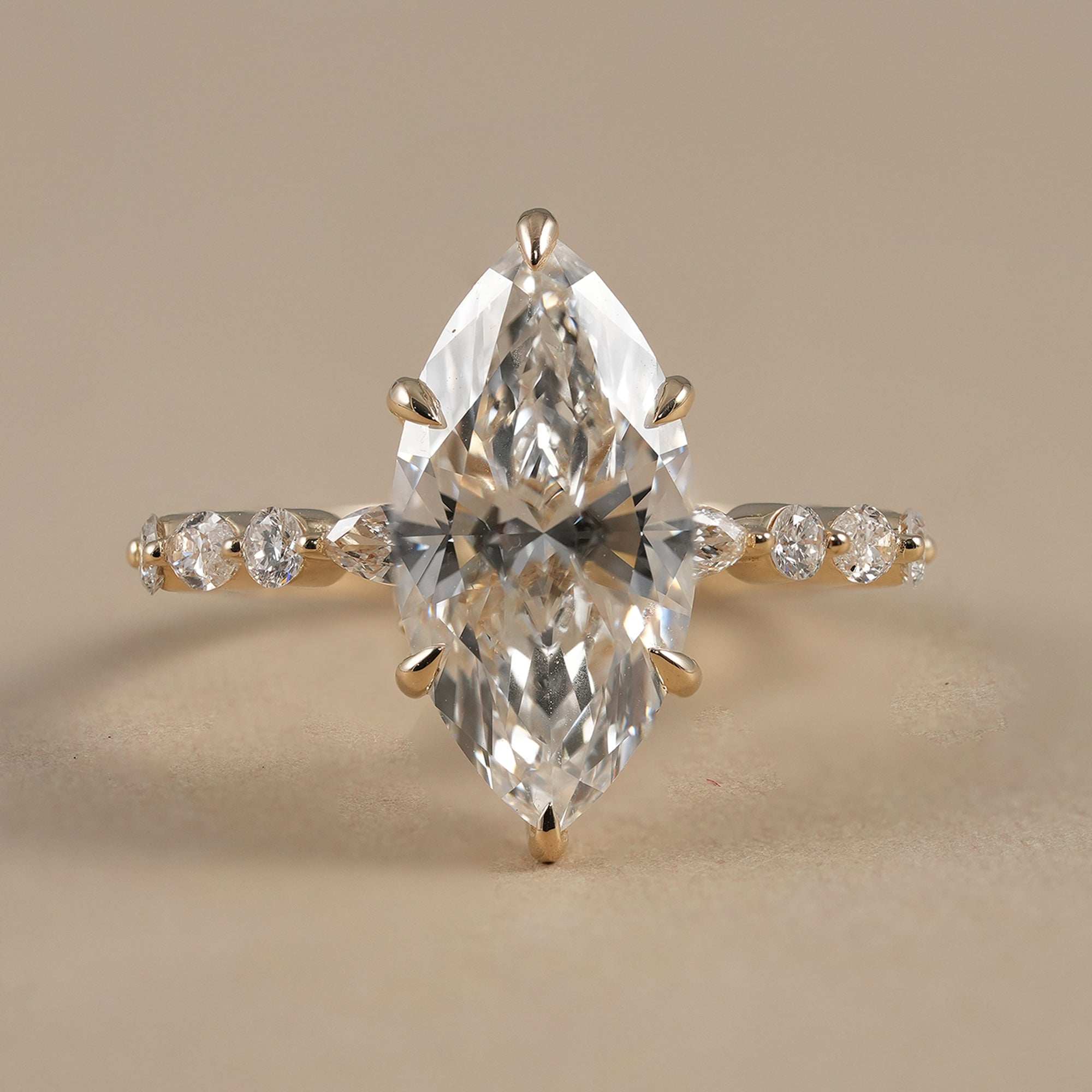 Marquise lab grown diamond engagement ring with hidden halo
