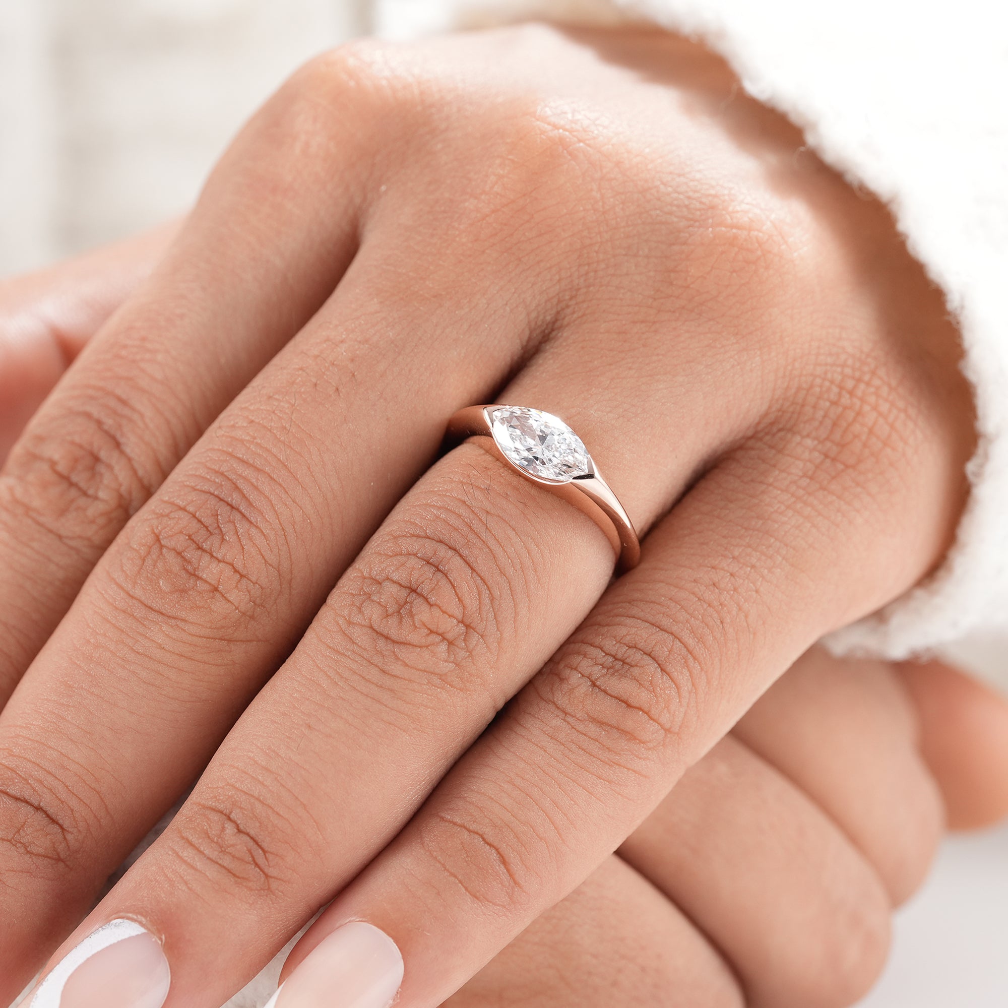 Ethical lab grown marquise diamond solitaire ring.