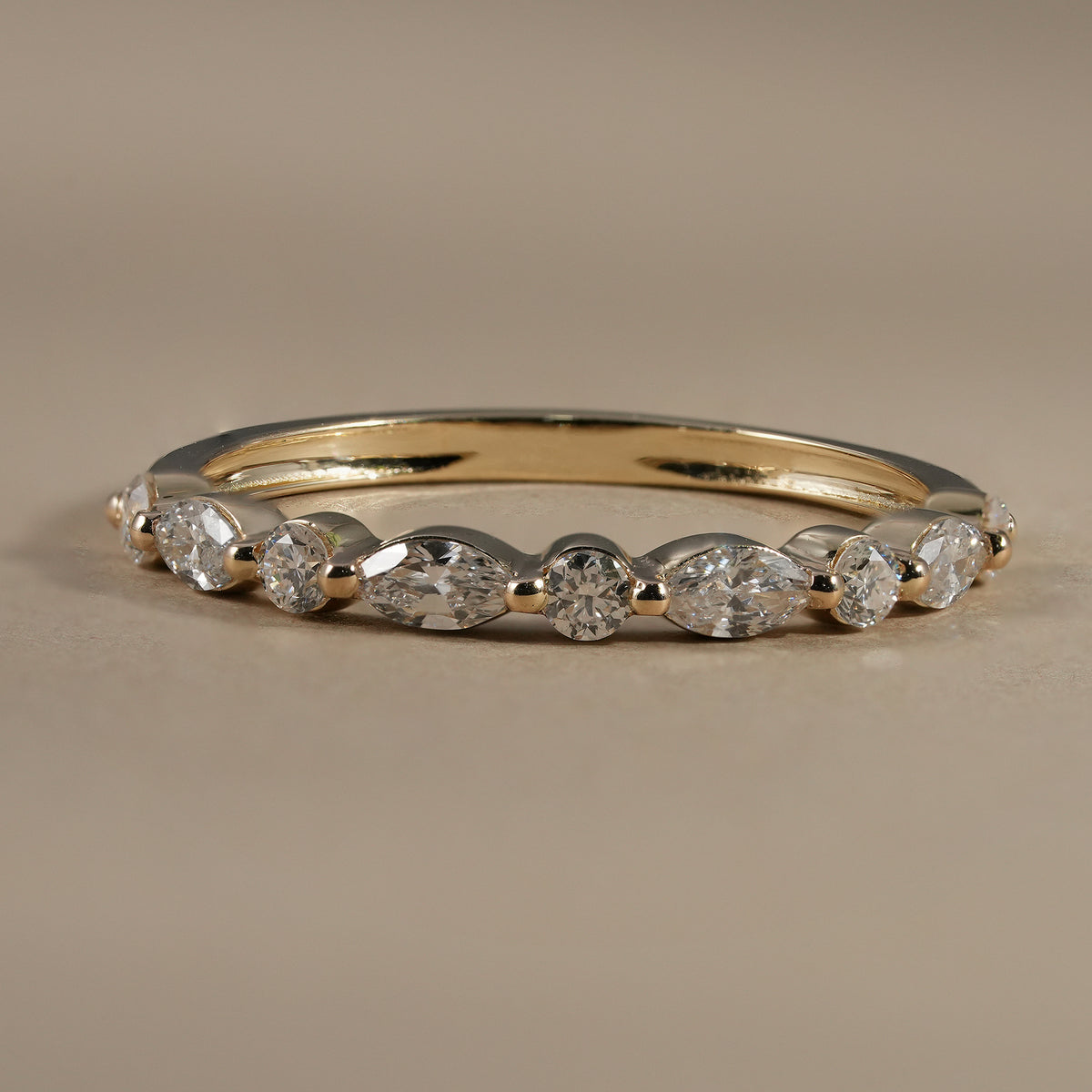 Marquise and round lab grown diamond half eternity wedding band handcrafted in solid gold.