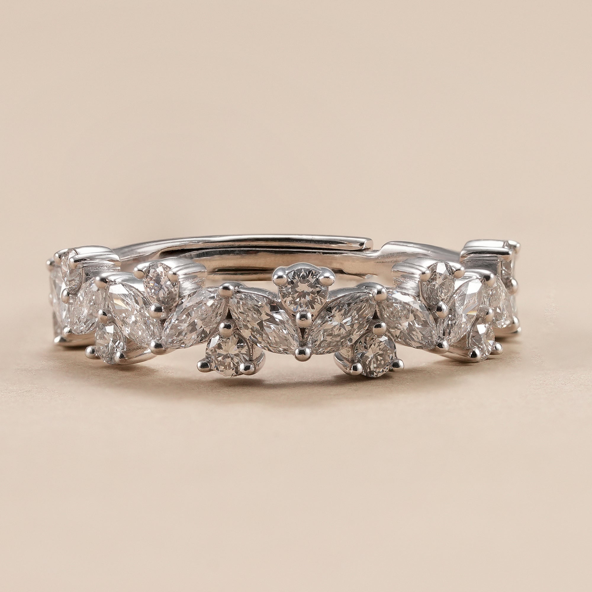 Marquise and round lab grown diamond eternity band with elegant leaf-inspired design.