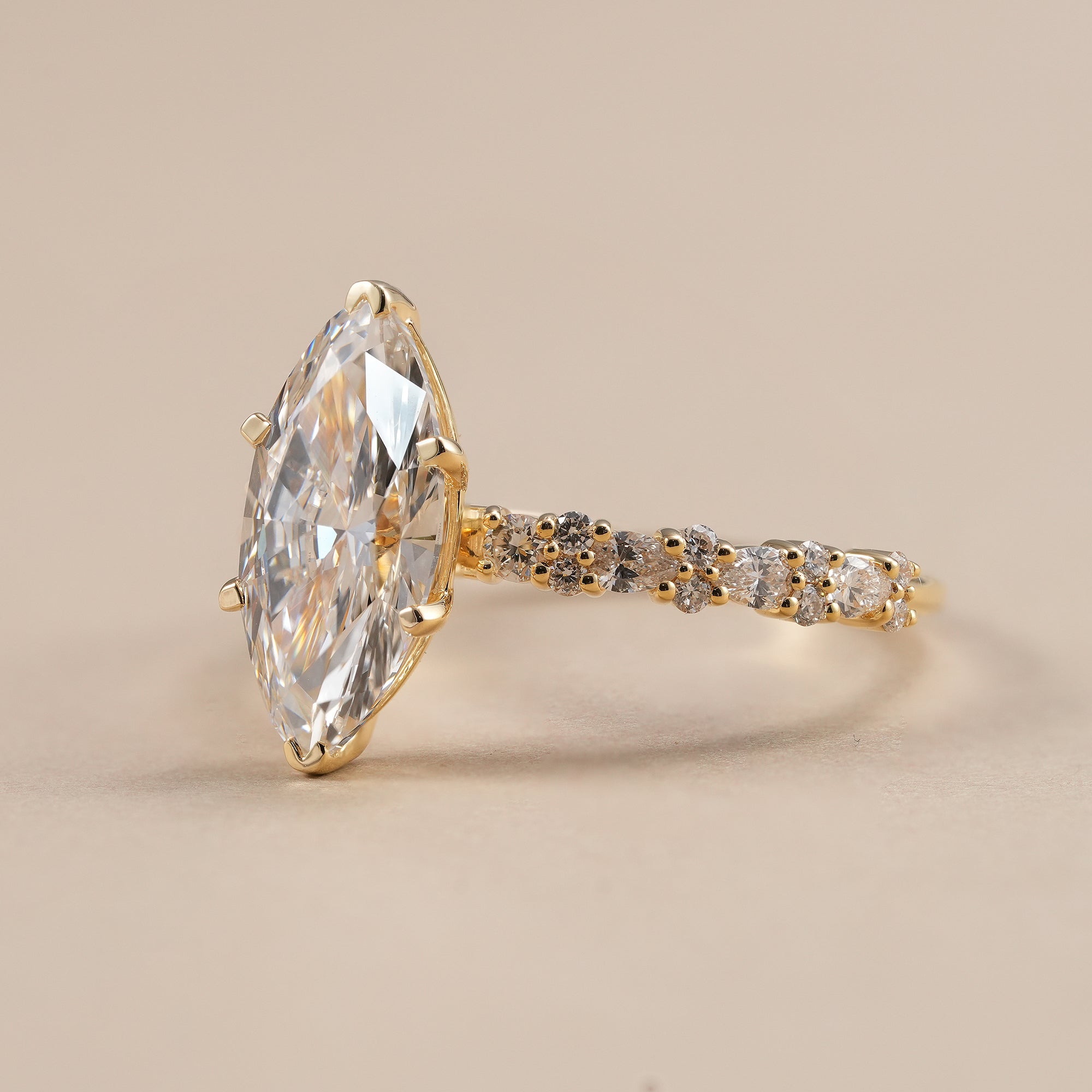 Six prong marquise solitaire diamond ring in yellow gold