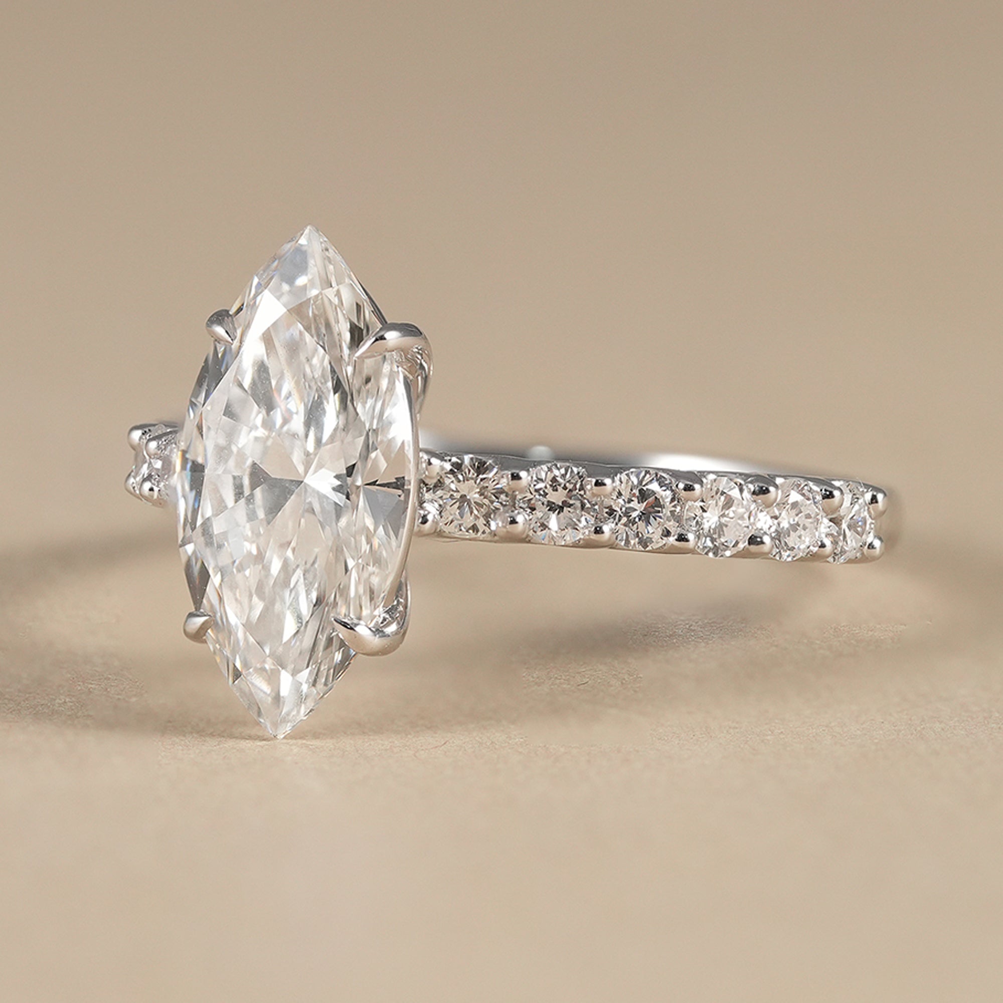 Women's marquise lab diamond wedding ring with sparkling accents