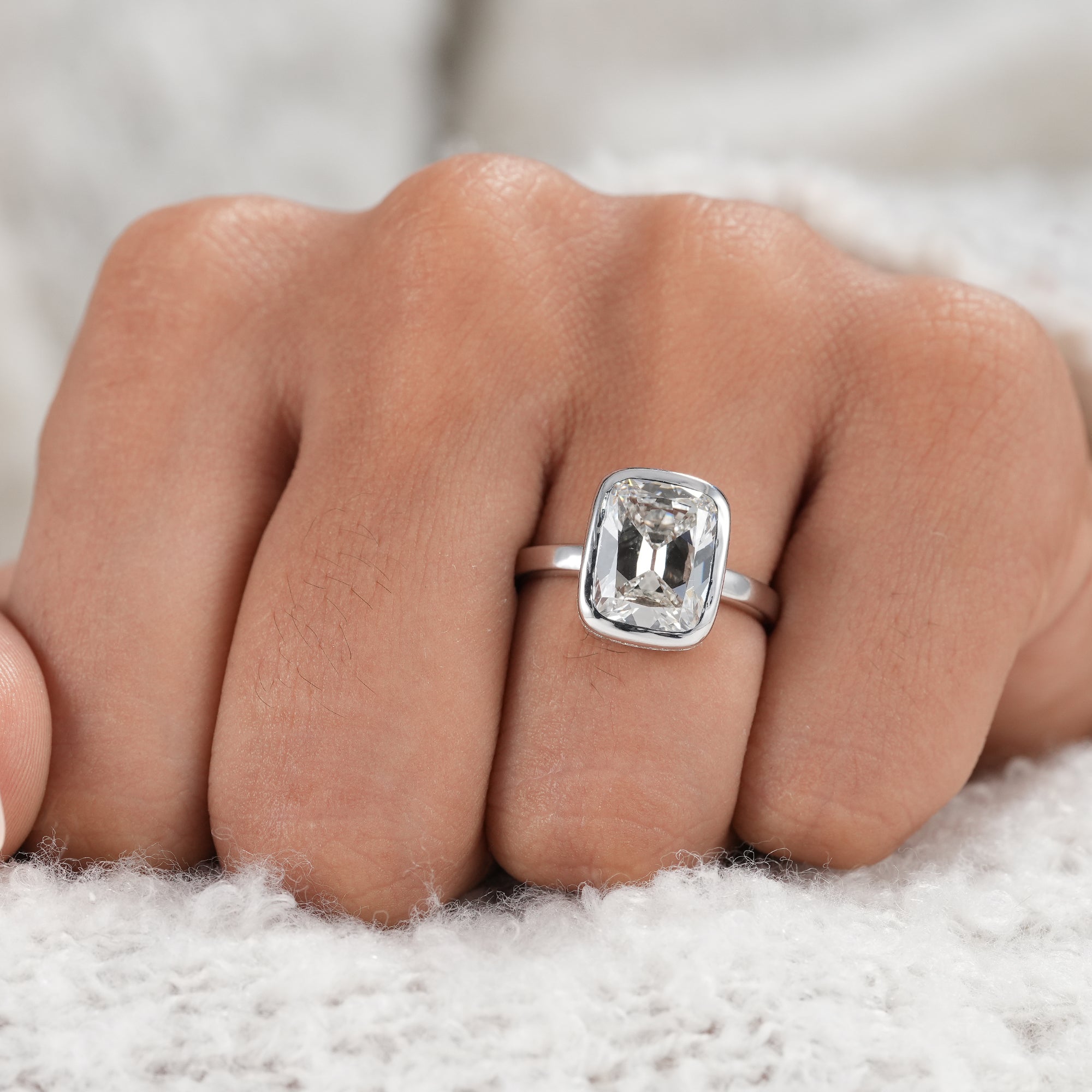 Fine jewelry cushion lab diamond engagement ring.
